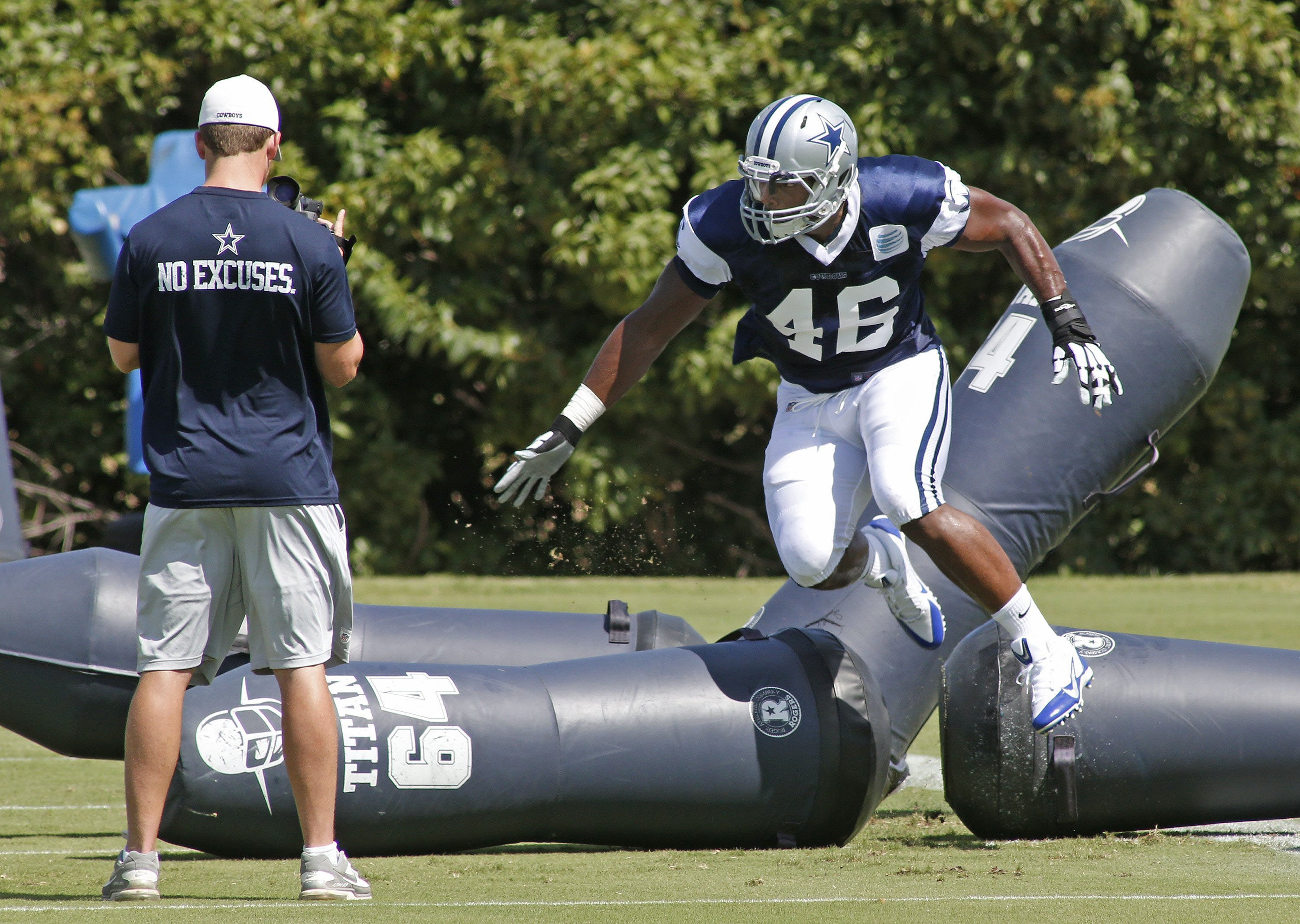 Dallas Cowboys practice squad player Michael Sam makes his first appearance at the team's practice facility on Sept. 3, 2014 in Irving, Texas.