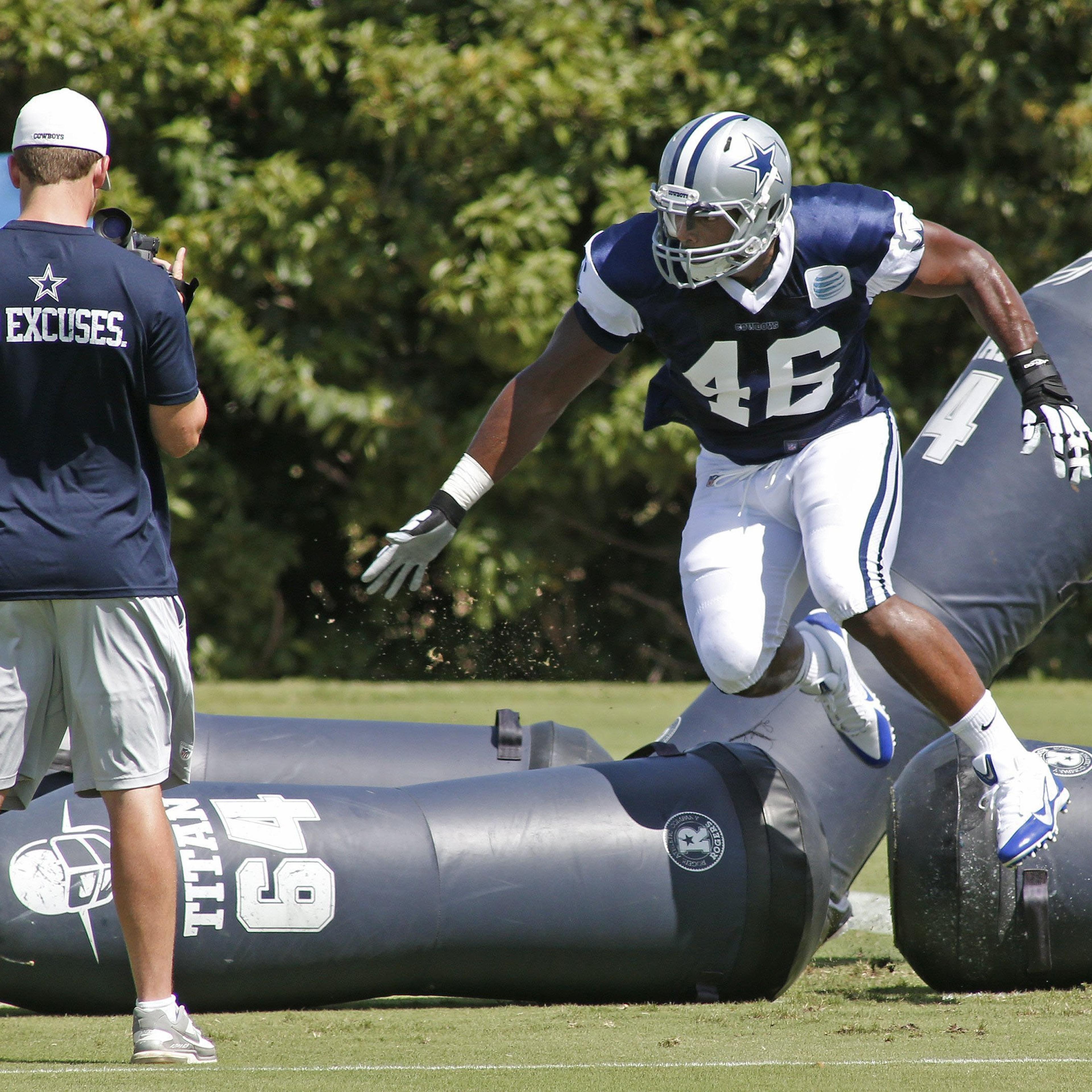 Dallas Cowboys practice squad player Michael Sam makes his first appearance at the team's practice facility on Sept. 3, 2014 in Irving, Texas.