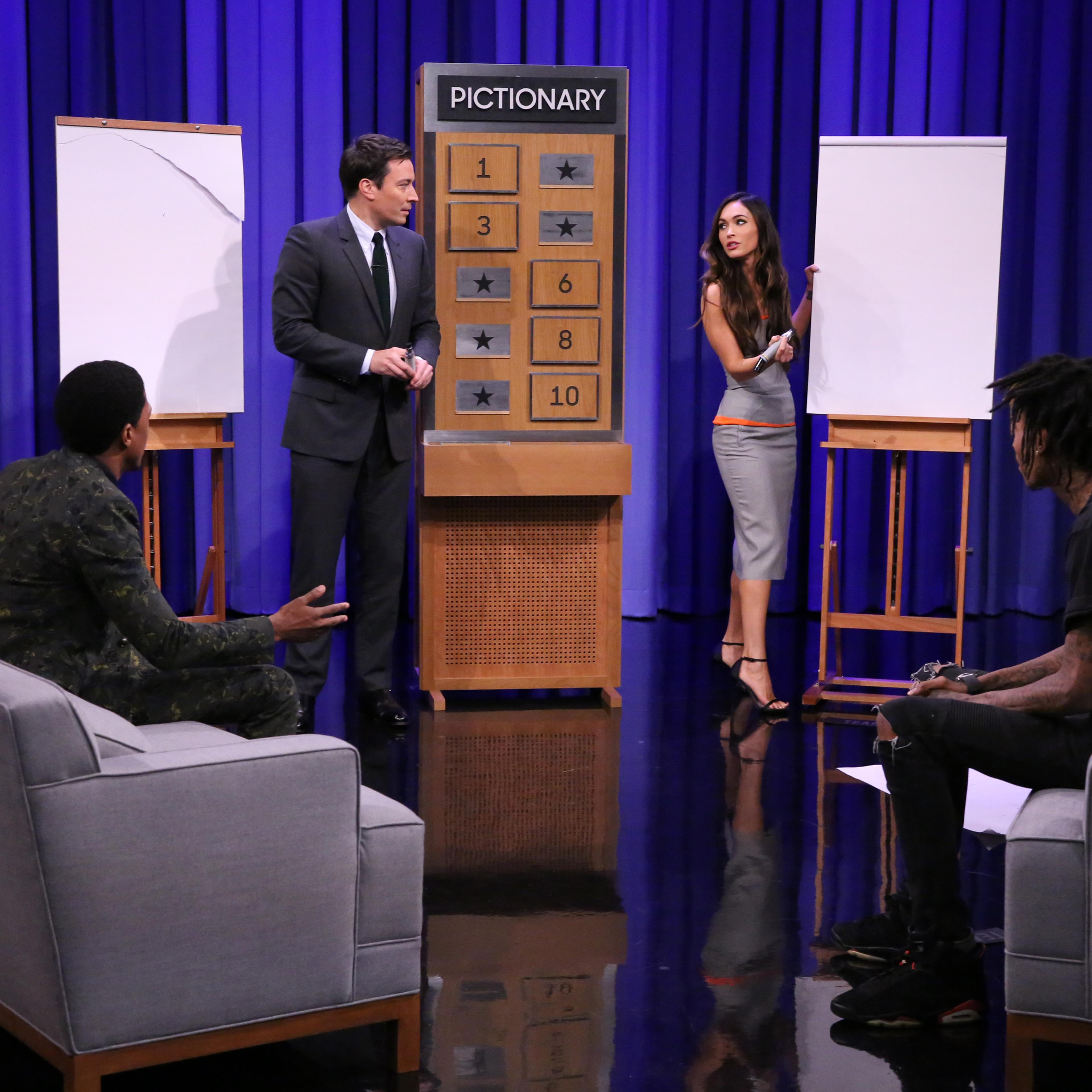 Actor Nick Cannon, host Jimmy Fallon, actress Megan Fox and rapper Wiz Khalifa play pictionary on August 6, 2014