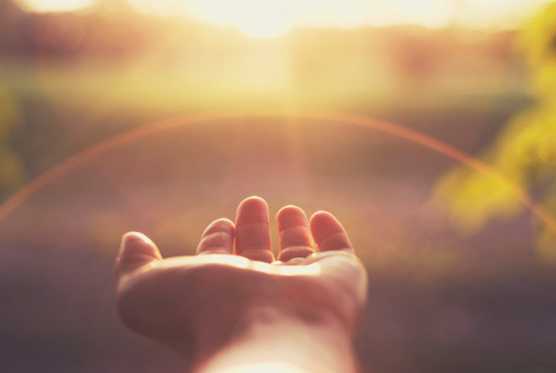 hand-reaching-out-sunlight
