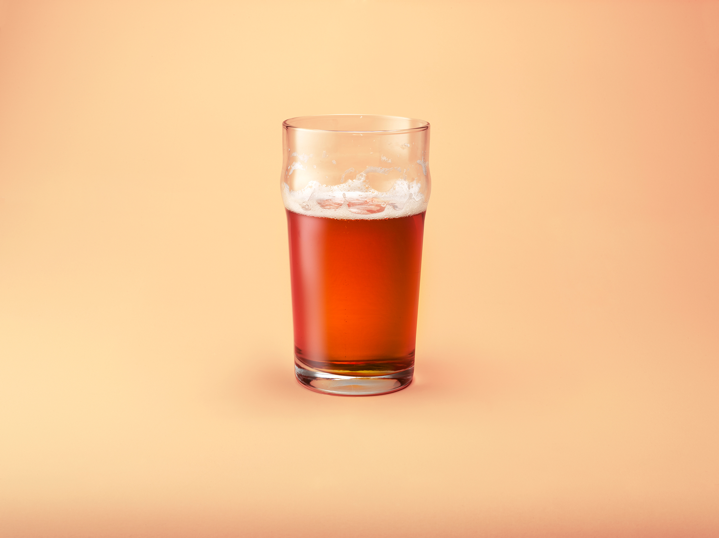 A half drunk pint of beer