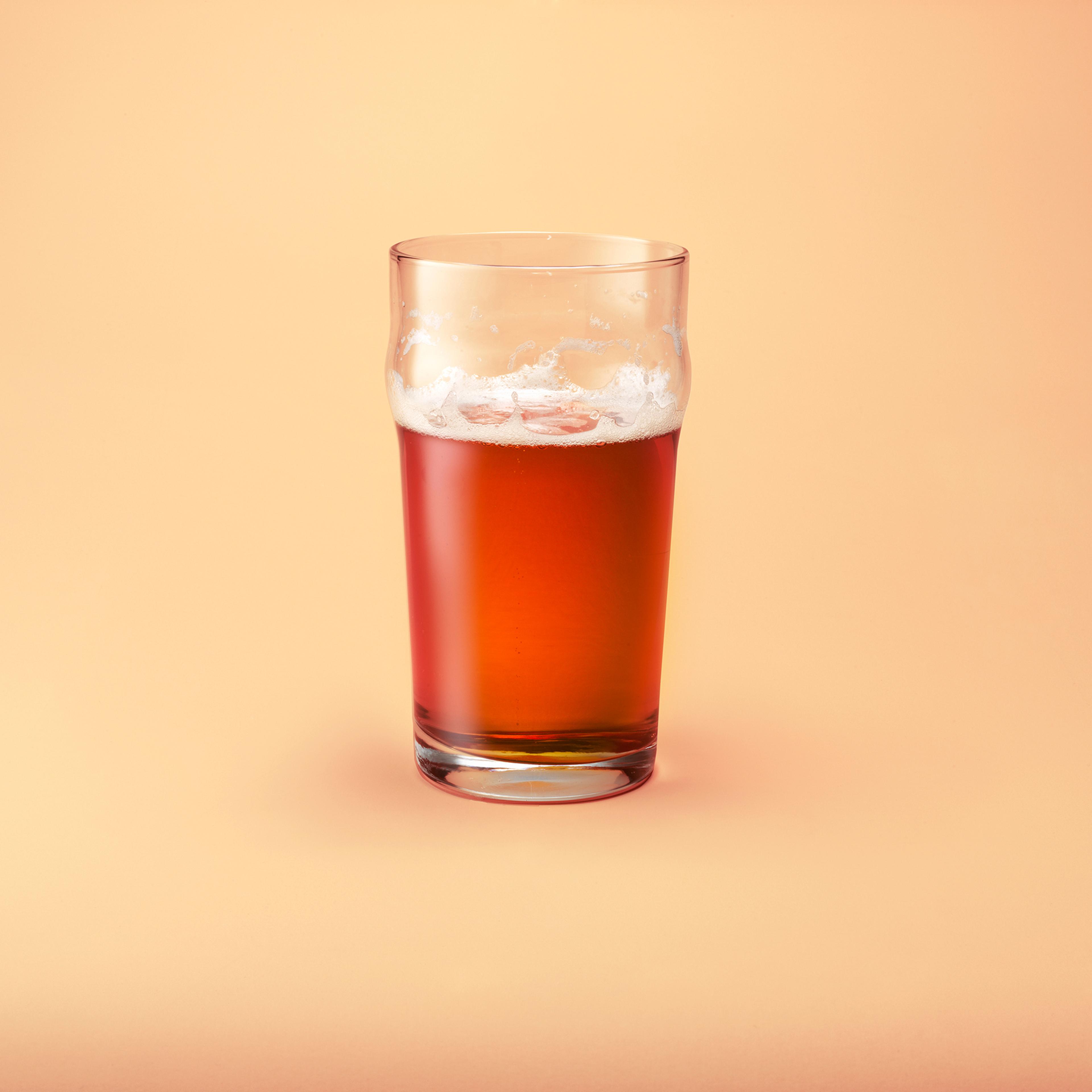 A half drunk pint of beer