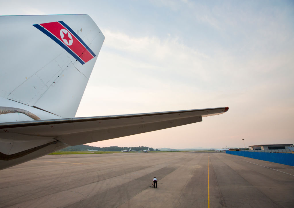 Air Koryo plane tail on the tarmac of Sunan international airport, Pyongan Province, Pyongyang, North Korea