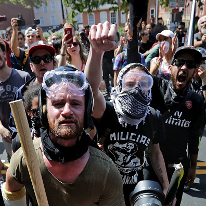 Anti-fascist counter-protesters wait outside Emancipation Park to hurl insluts as white nationalists, neo-Nazis and members of the "alt-right" are forced out after the "Unite the Right" rally was declared an unlawful gathering August 12, 2017 in Charlott