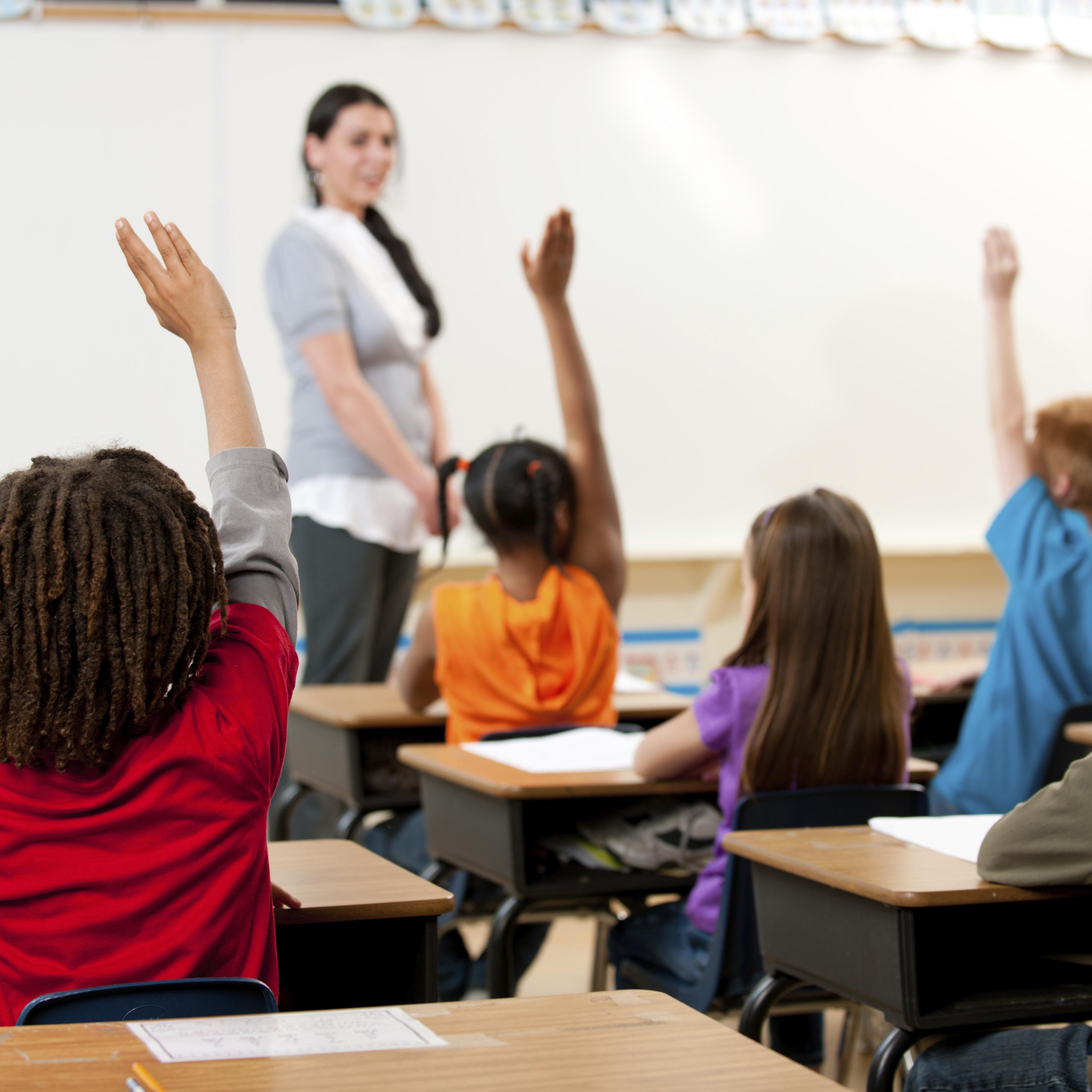 classroom-children-students-raising-hands