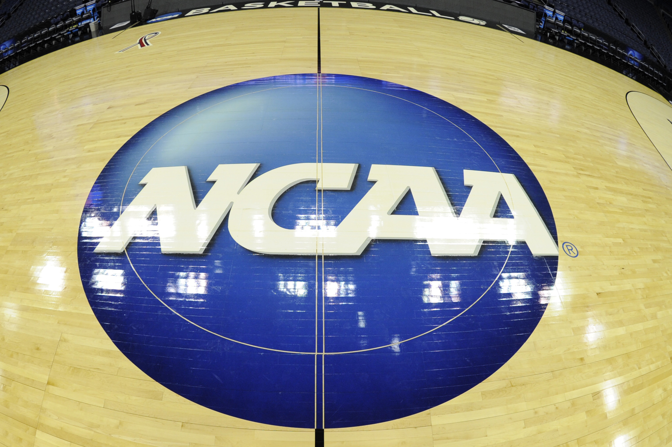The NCAA logo on the floor before the third round of the 2015 NCAA Men's Basketball Tournament on March 22, 2015 in Columbus, Ohio.