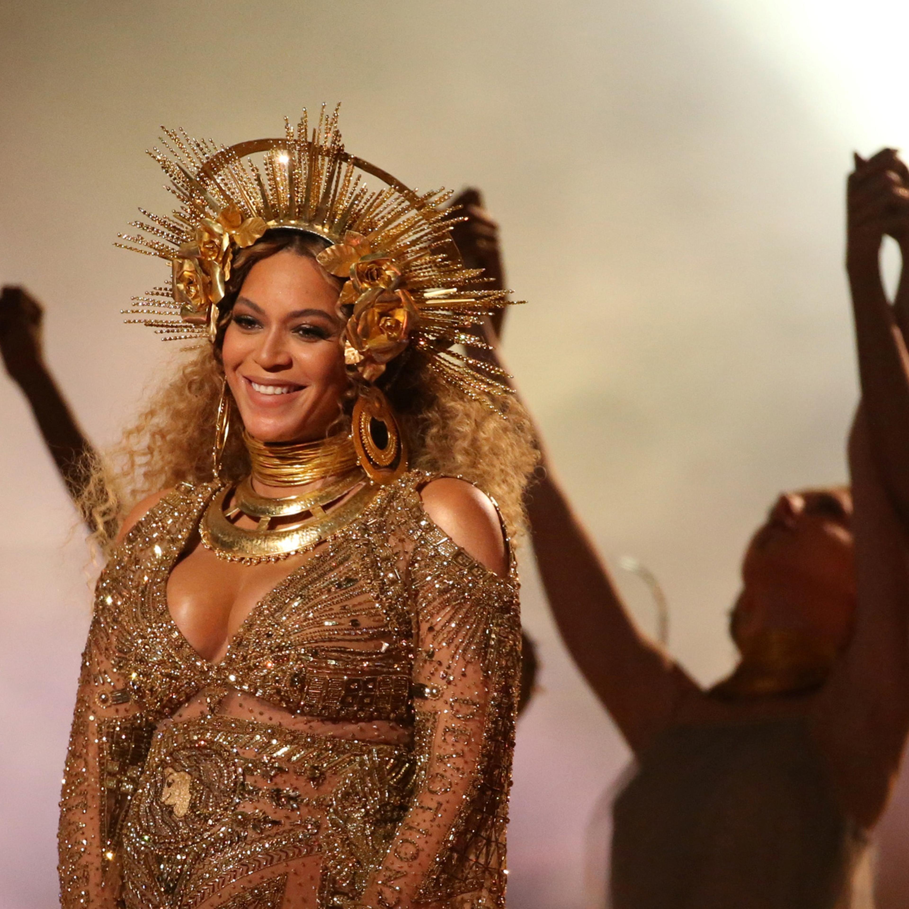 FILE PHOTO - Beyonce performs at the 59th Annual Grammy Awards in Los Angeles
