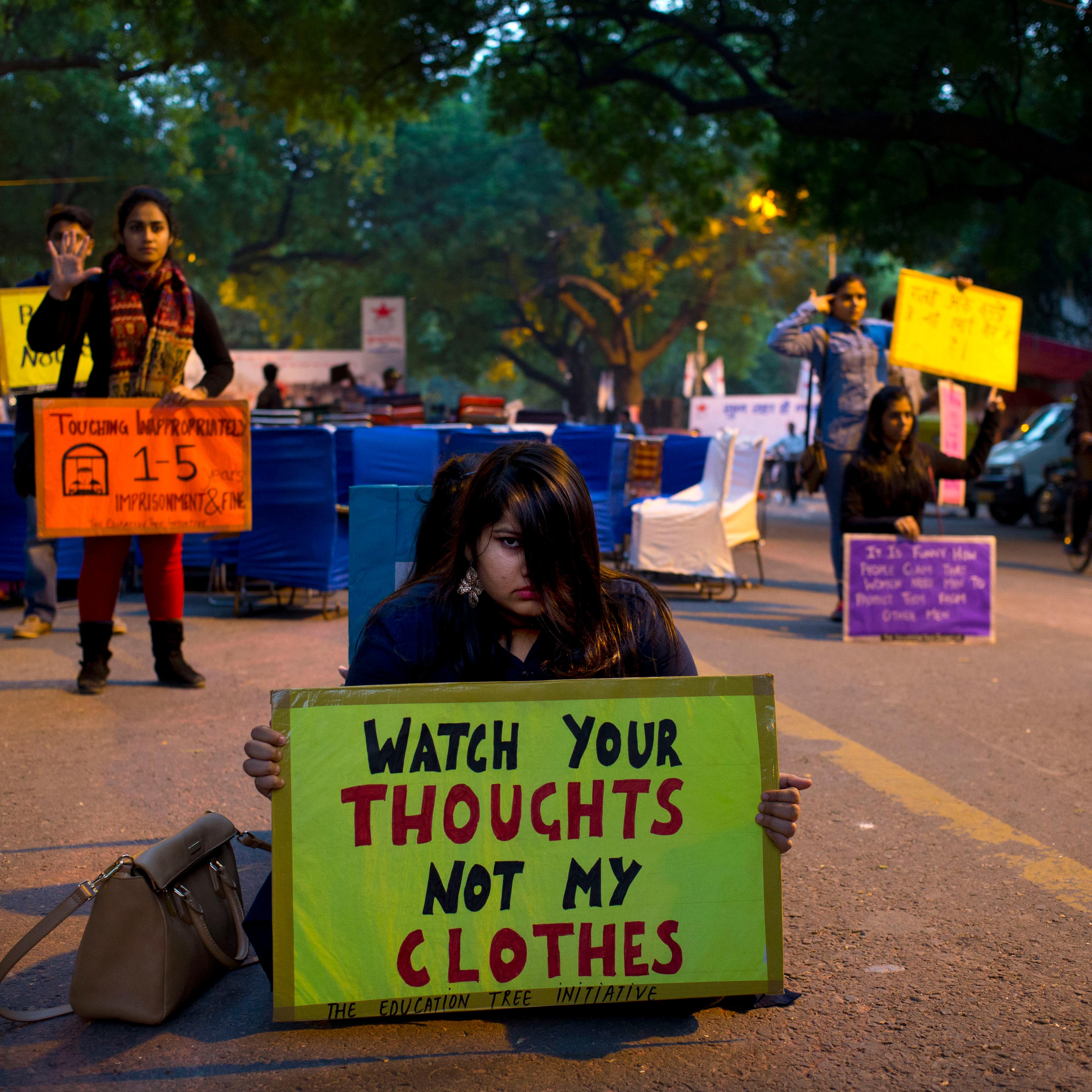 A flash mob performs during a candlelit vigil protesting violence against women as they mark the second anniversary of the deadly gang rape occurred in New Delhi on Dec. 16, 2014.