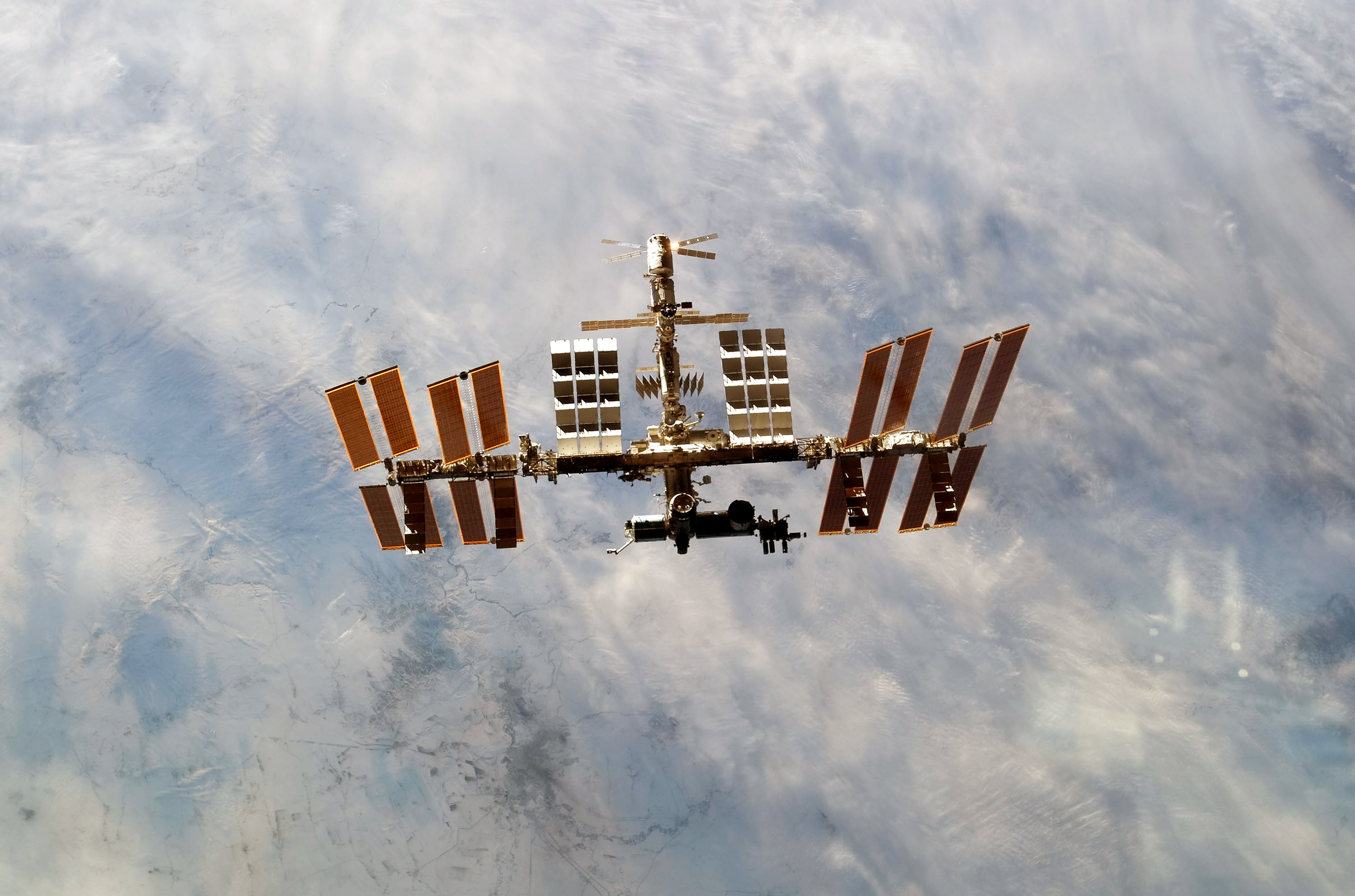 Space Shuttle Discovery Continues On Its Last Mission