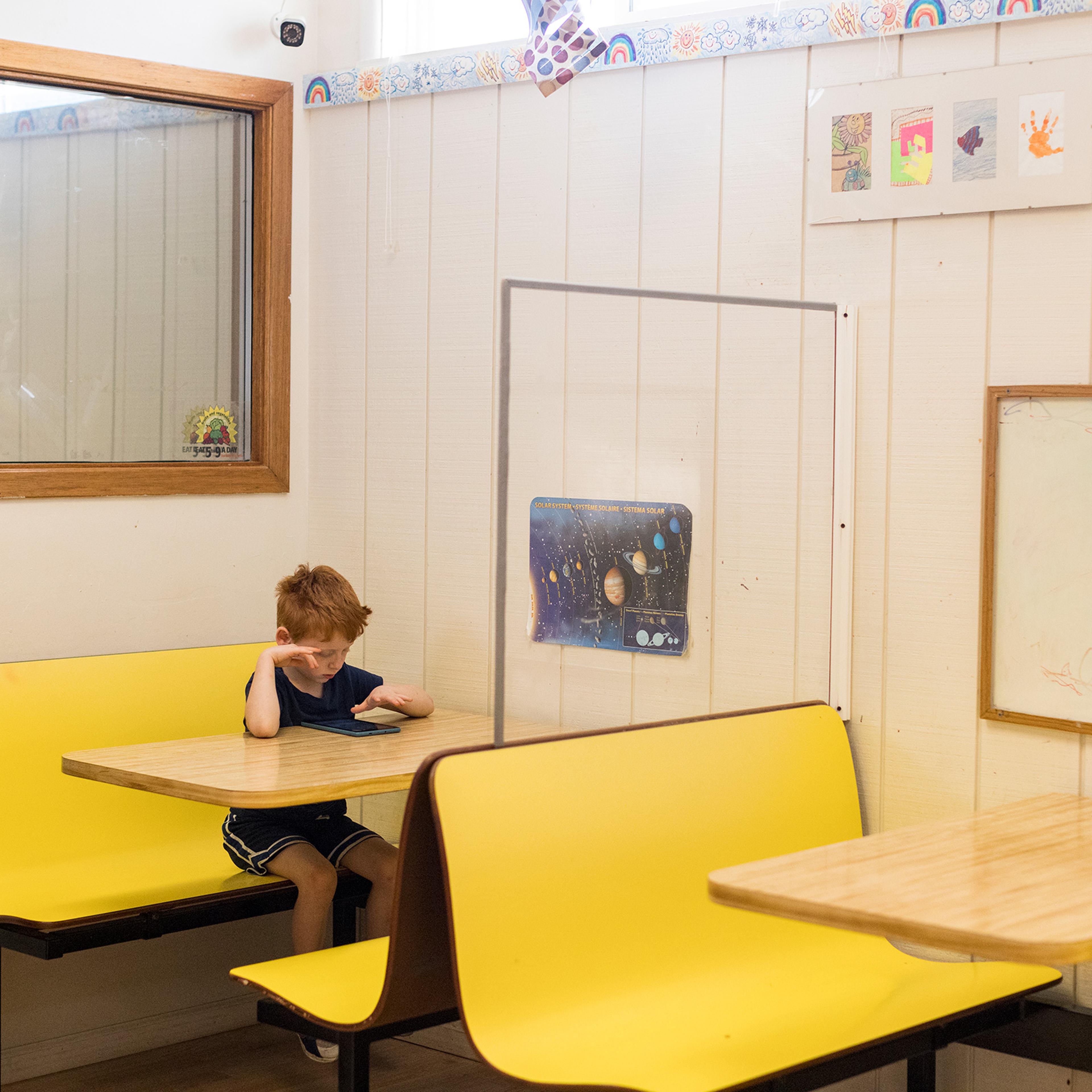 Riley Wilkinson, age 5, is one of the few children still enrolled at Tipton Adaptive Daycare in Tipton, Iowa, before the center closes on Aug. 19.