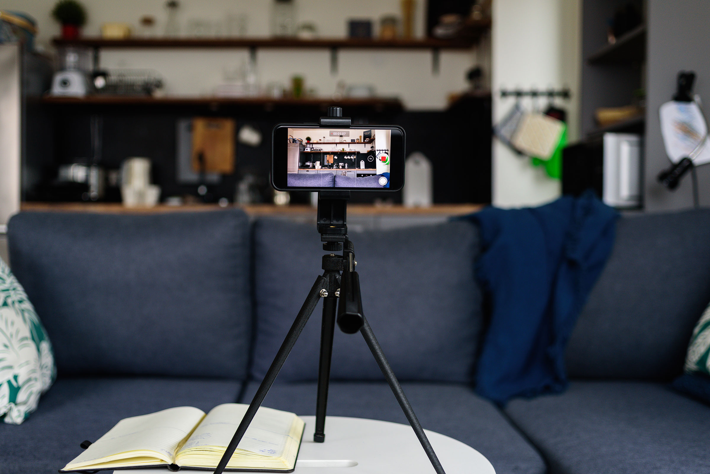 Recording equipment in living room for home video blog