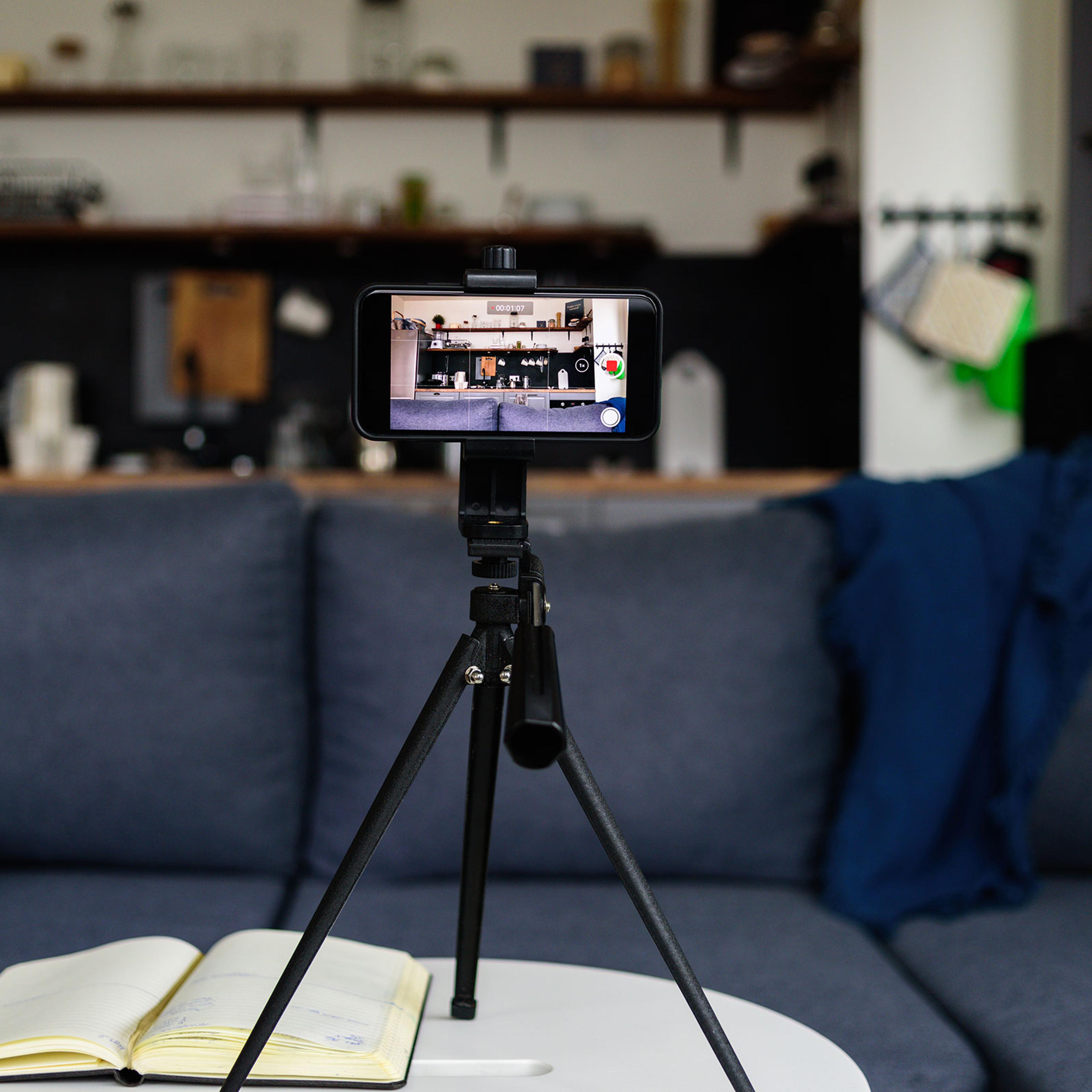Recording equipment in living room for home video blog