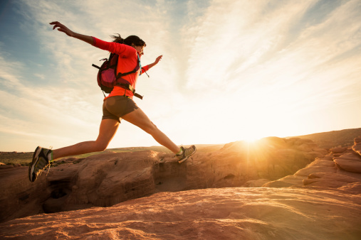 female-hiker-jumping