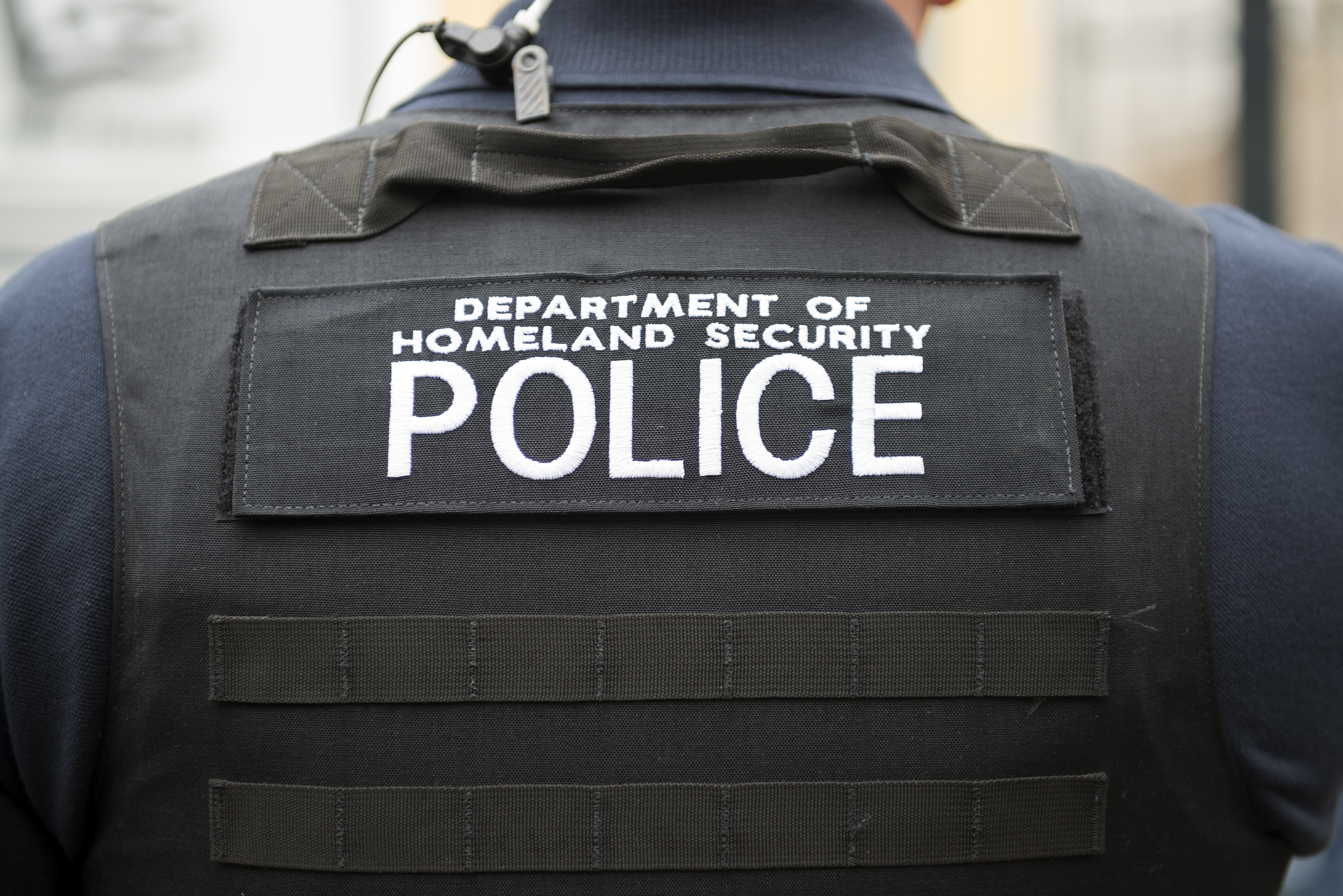 Department of Homeland Security vest and officer