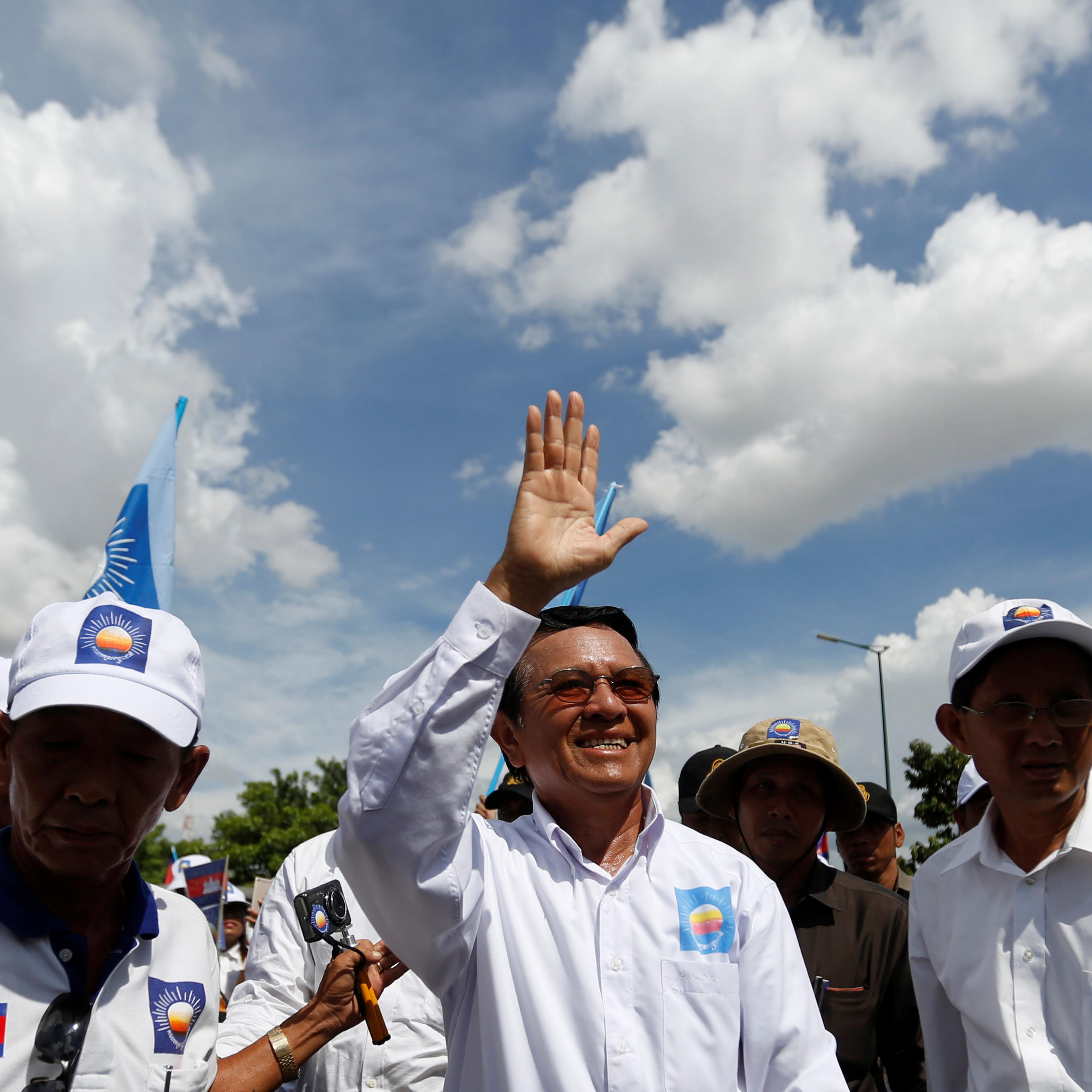 President of the opposition Cambodia National Rescue Party Kem Sokha arrives at a campaign rally in Phnom Penh