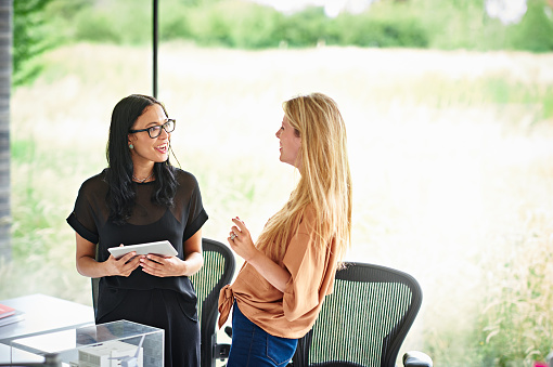 women-colleagues-talking