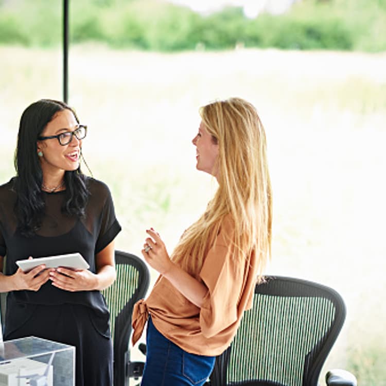 women-colleagues-talking