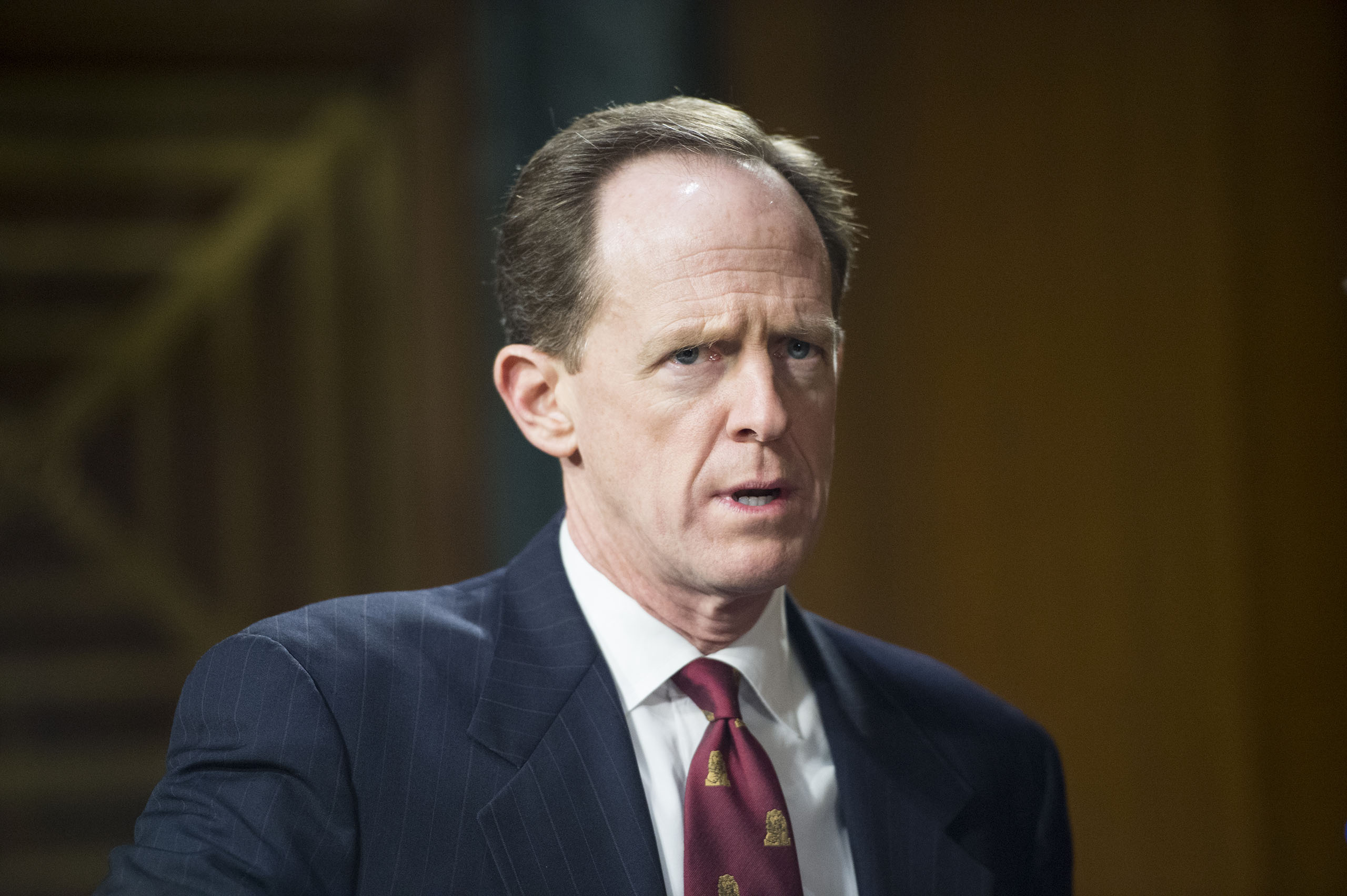 Pat Toomey arrives for the Senate Banking, Housing and Urban Affairs Committee hearing on "The Semiannual Monetary Policy Report to the Congress" on Feb. 24, 2015.