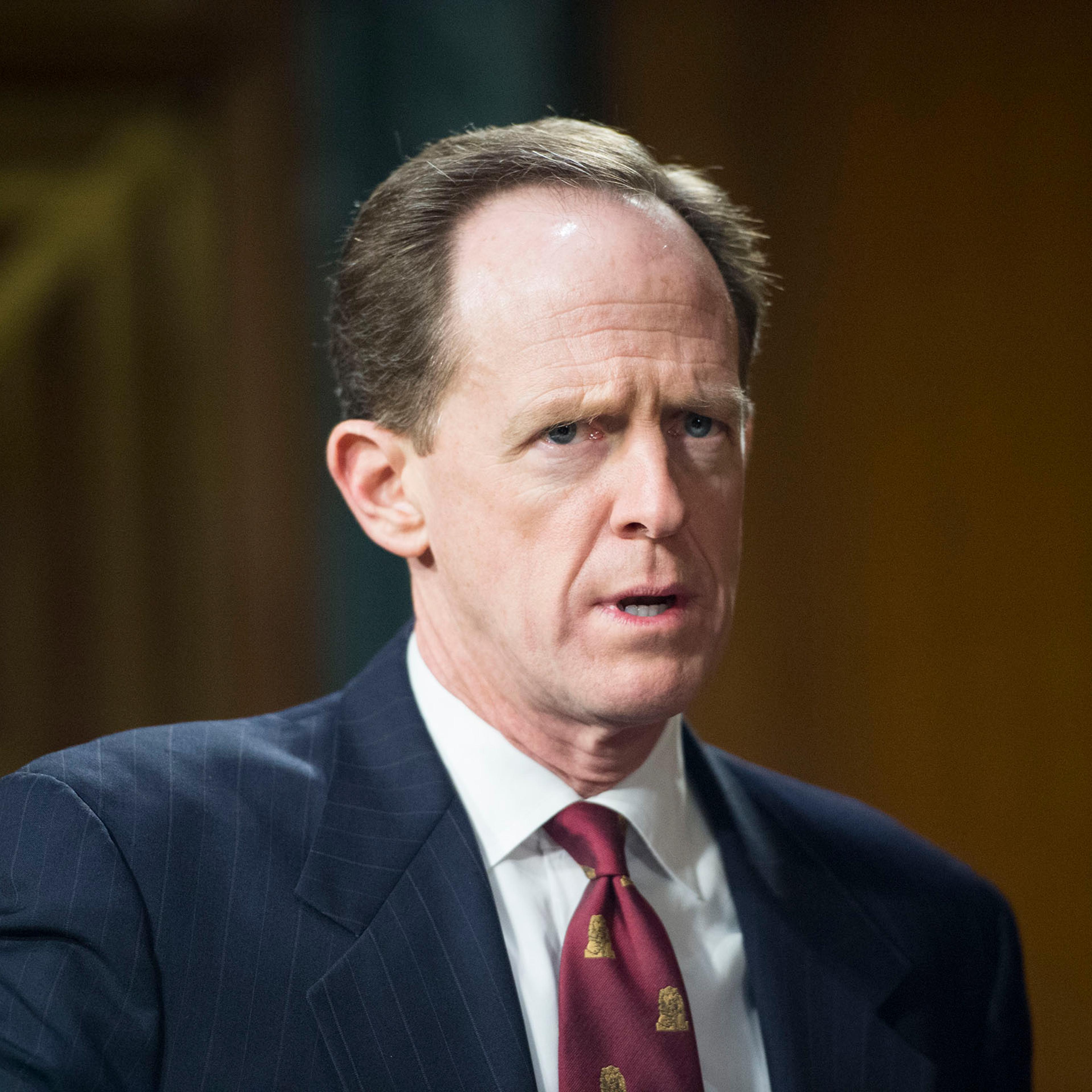 Pat Toomey arrives for the Senate Banking, Housing and Urban Affairs Committee hearing on "The Semiannual Monetary Policy Report to the Congress" on Feb. 24, 2015.