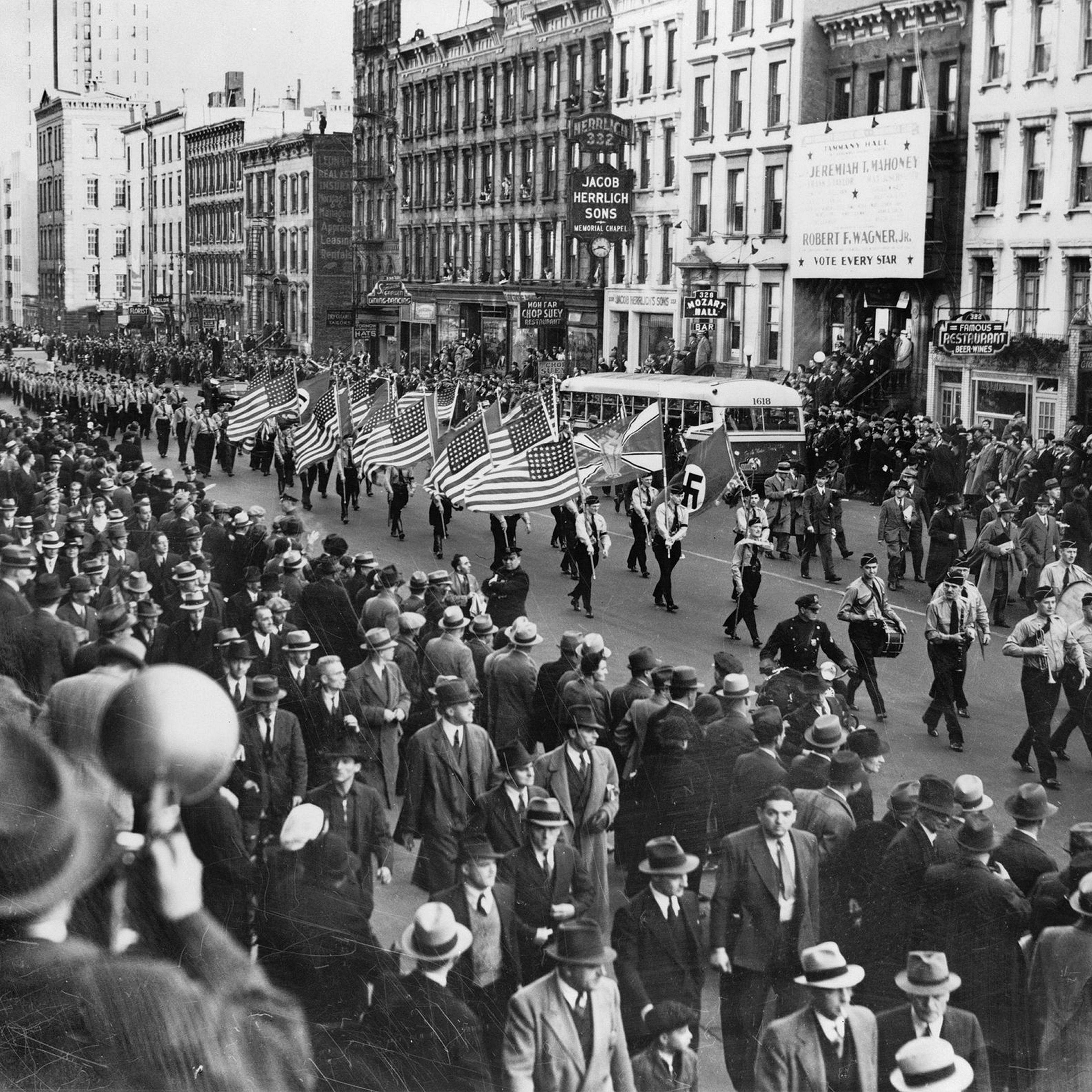 American Nazis parade on East 86th St. in New York City around 1939.