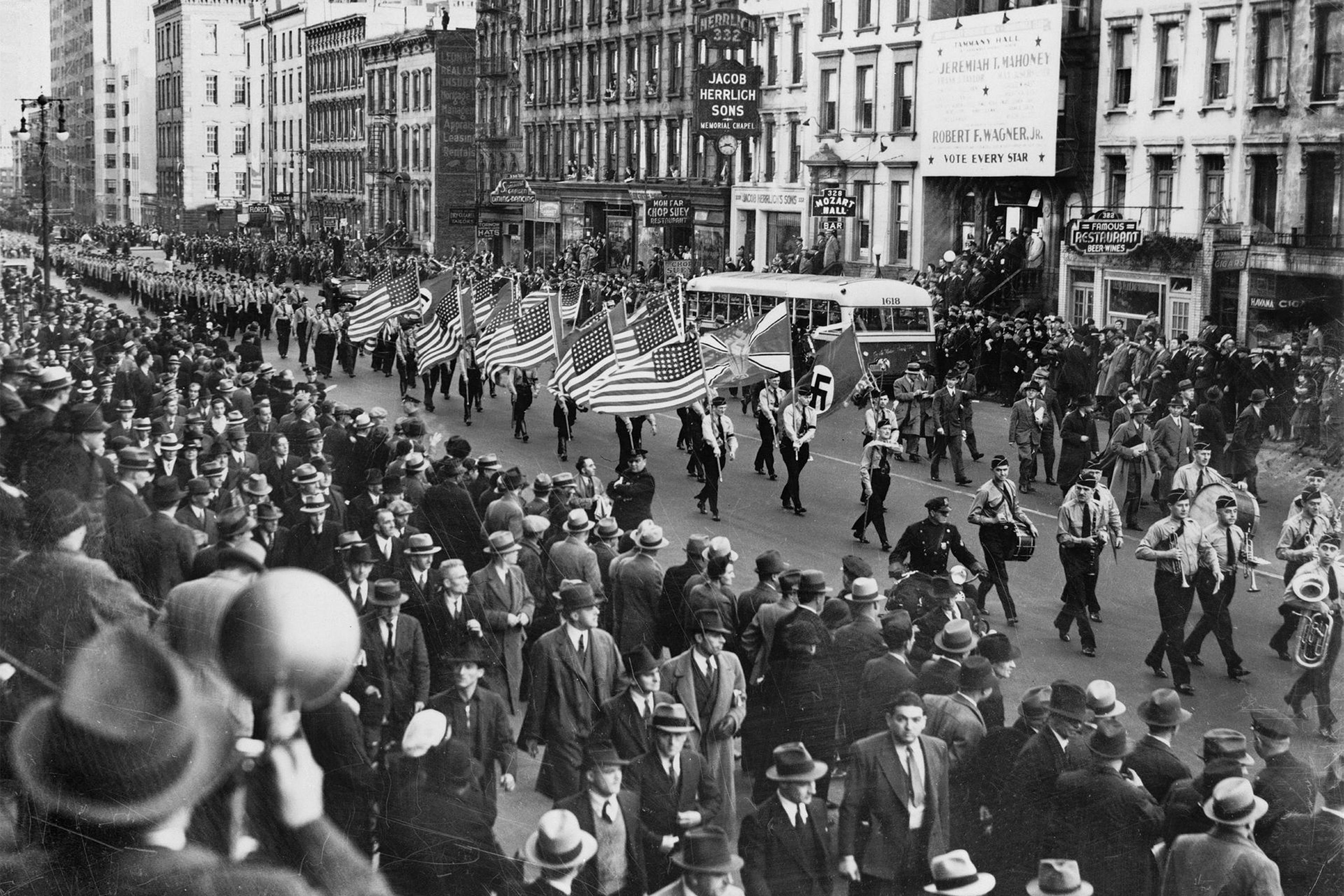 American Nazis parade on East 86th St. in New York City around 1939.