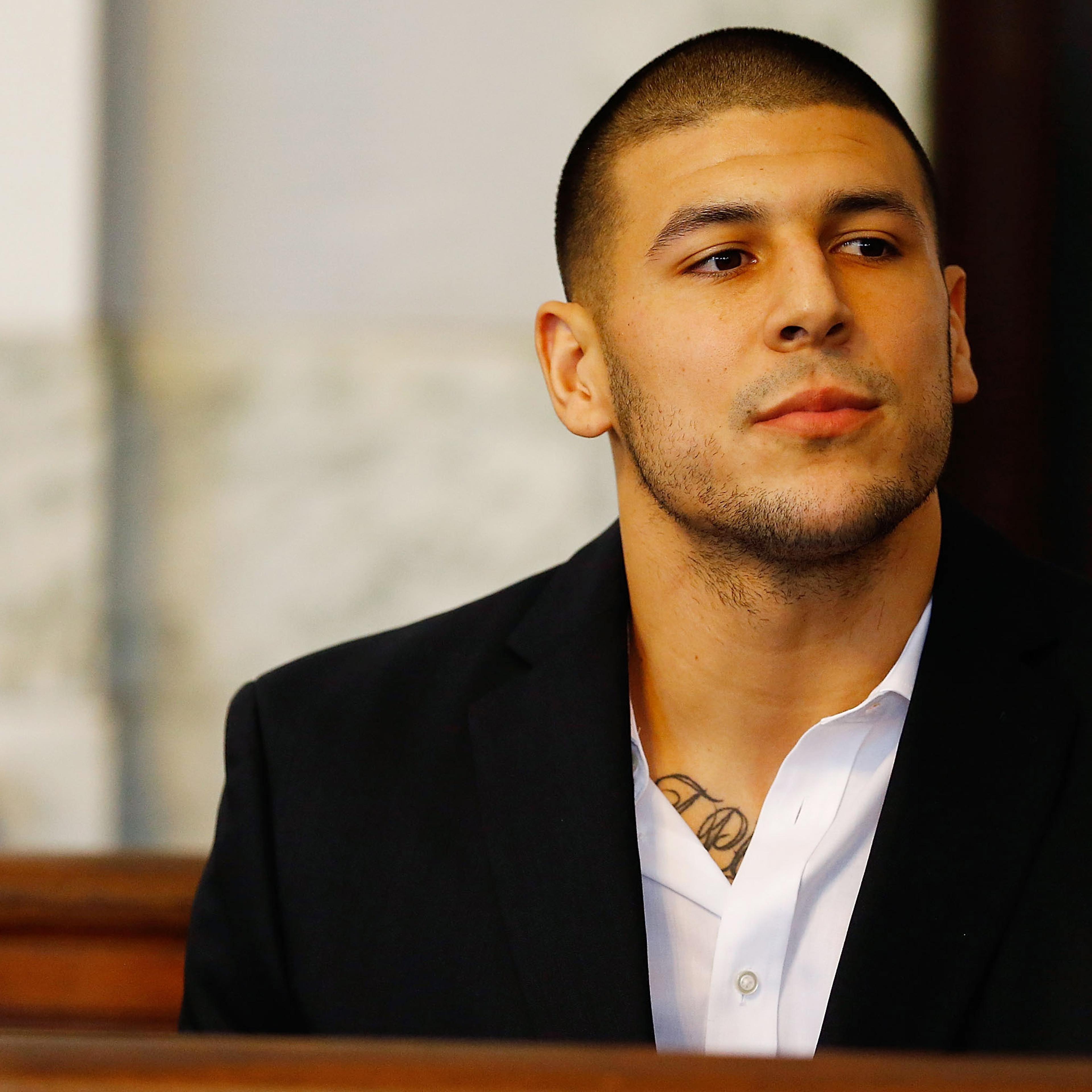 Aaron Hernandez sits in the courtroom of the Attleboro District Court during his hearing on Aug. 22, 2013 in North Attleboro, Massachusetts.