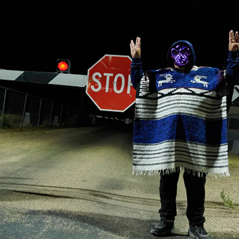 A man poses for photos as attendees gather to "storm" Area 51 at an entrance to the military facility near Rachel, Nevada on September 20, 2019.