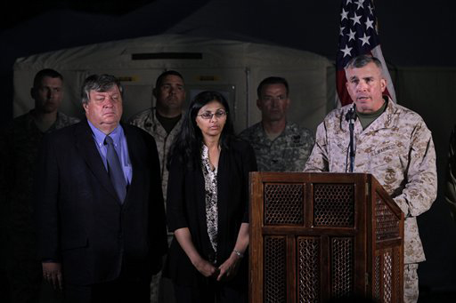 Lt. Gen. John E. Wissler, right, speaks during a press meet in Kathmandu