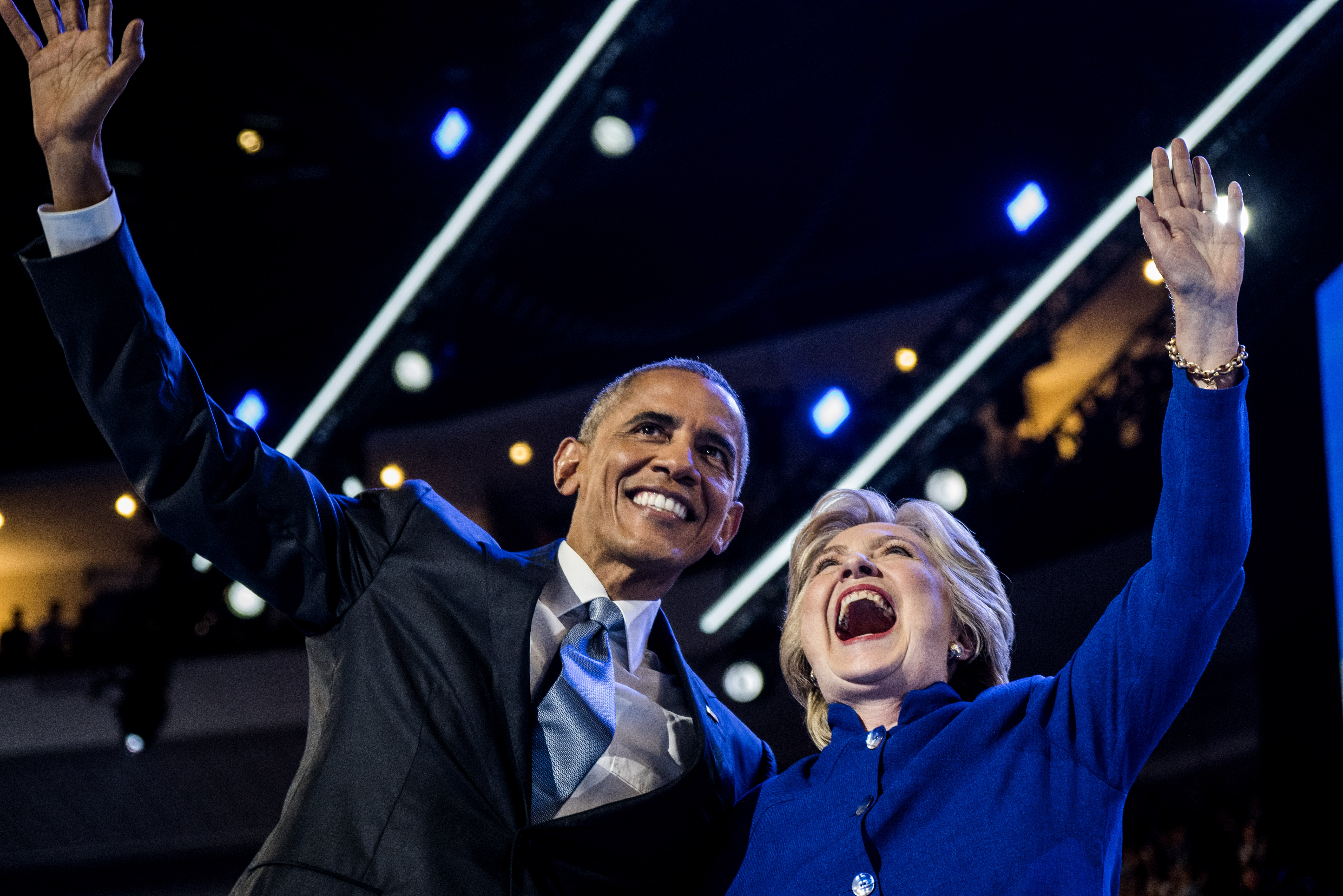 President Barack Obama is joined by Hillary Clinton after Obama delivered remarks on the third day of the Democratic National Convention at the Wells Fargo Center, July 27, 2016 in Philadelphia.