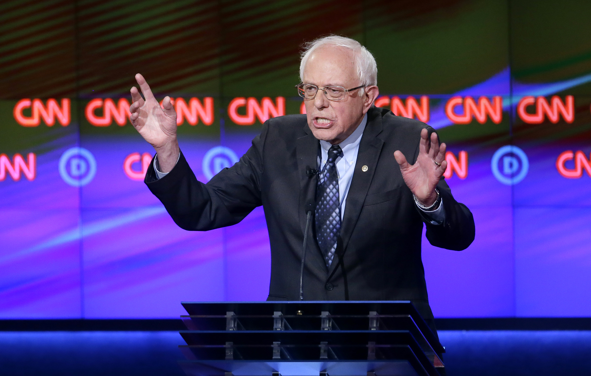 Sen. Bernie Sanders makes a point during a Democratic presidential primary debate at the University of Michigan-Flint in Flint, Mich. on March 6, 2016.