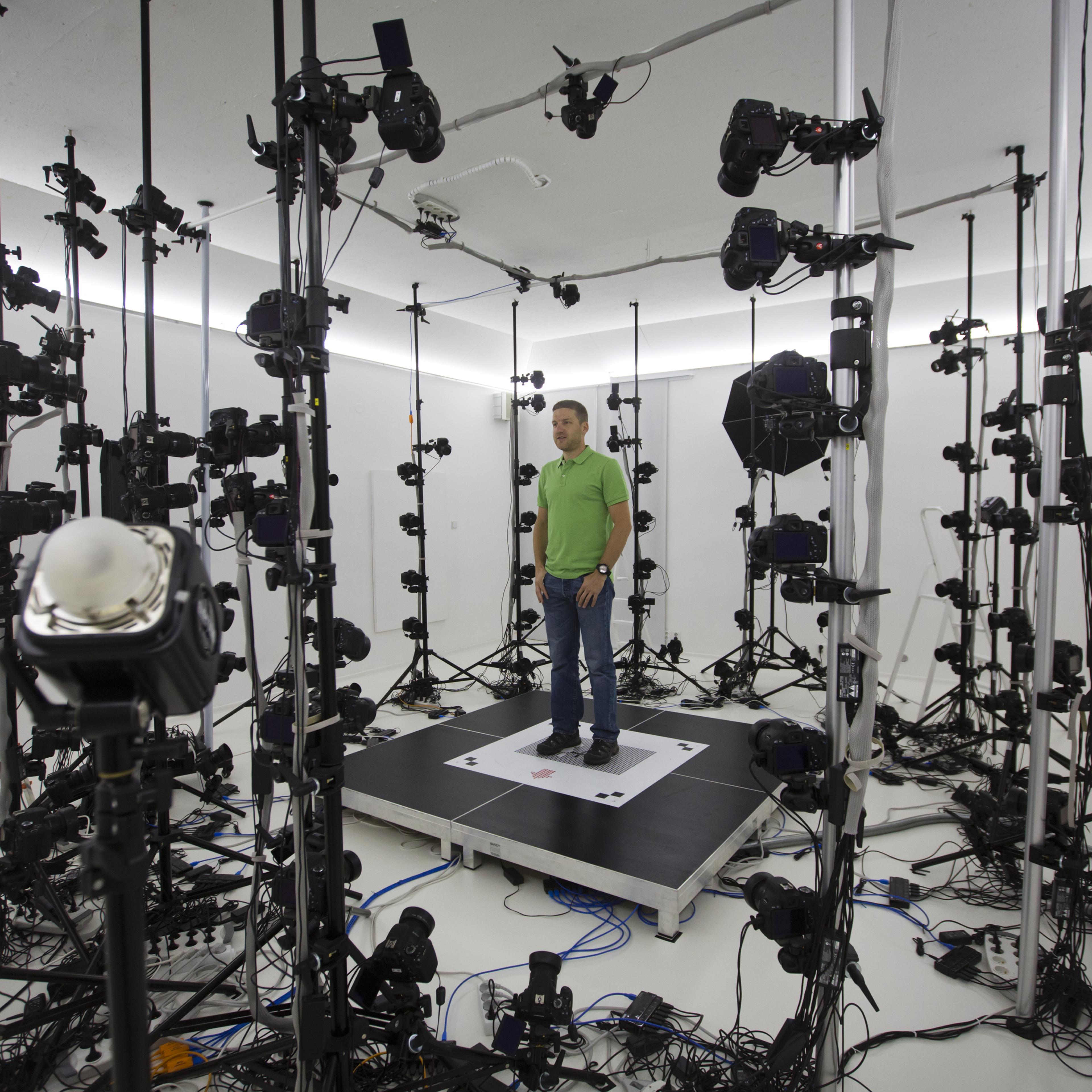 Martin Benes from 3D gang company demonstrates one of the stages of 3D scanning on August 26, 2014 in Prague, Czech Republic. The 3D scanner is the largest in continental Europe, with 115 sensors, and is designed to scan objects, people and animals.