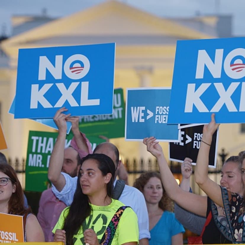 Activists, celebrating US President Barack Obama's blocking of the Keystone XL oil pipeline, rally in front of the White House in Washington, DC on November 6, 2015.