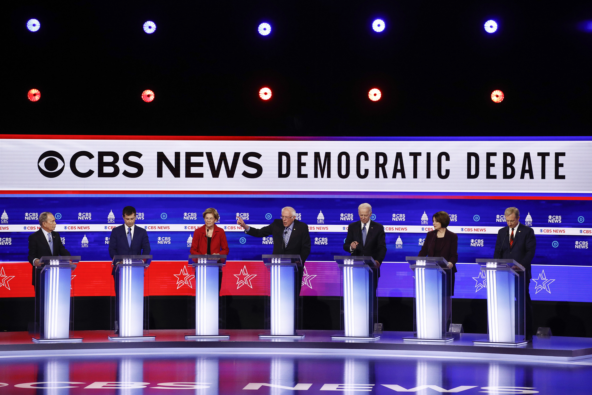 From left, Democratic presidential candidates, former New York City Mayor Mike Bloomberg, former South Bend Mayor Pete Buttigieg, Sen. Elizabeth Warren, D-Mass., Sen. Bernie Sanders, I-Vt., former Vice President Joe Biden, Sen. Amy Klobuchar, D-Minn., an