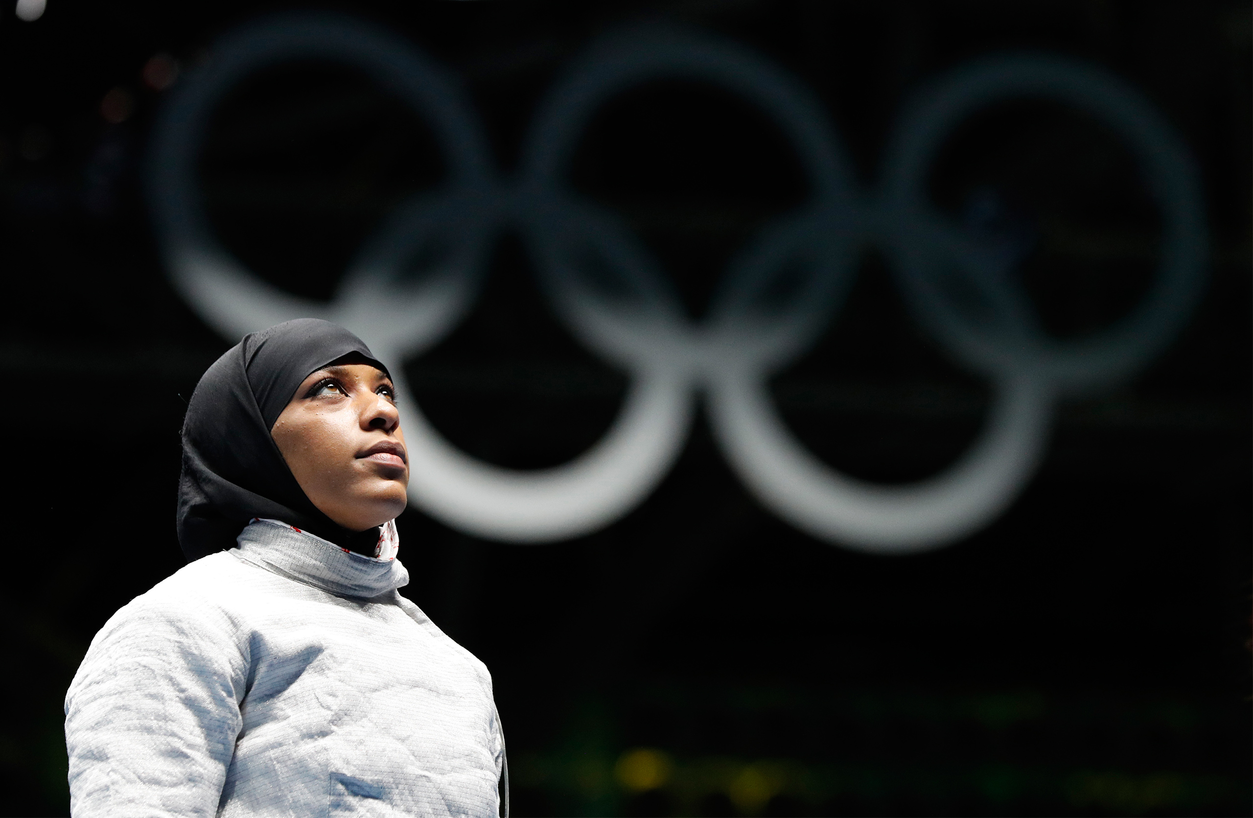 Ibtihaj Muhammad waits for a match against Olena Kravatska of Ukraine, in the women's saber individual fencing event at the Summer Olympics in Rio de Janeiro on Aug. 8, 2016.