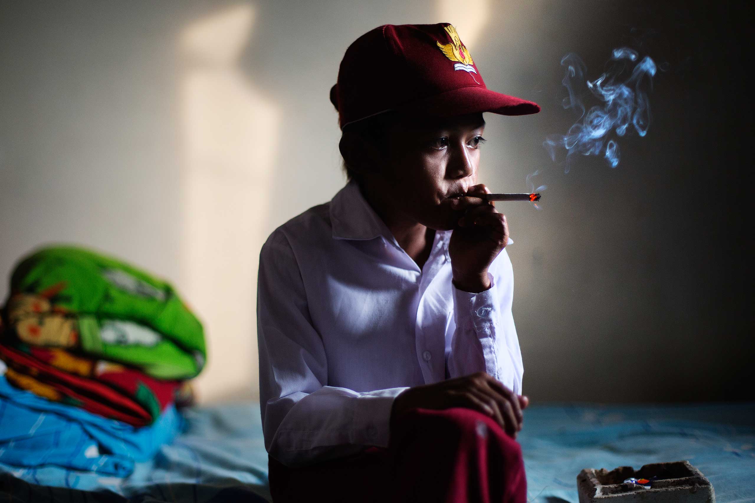 he smokes cigarettes Marlboro Boys': Photographing Underage Smoking in Indonesia