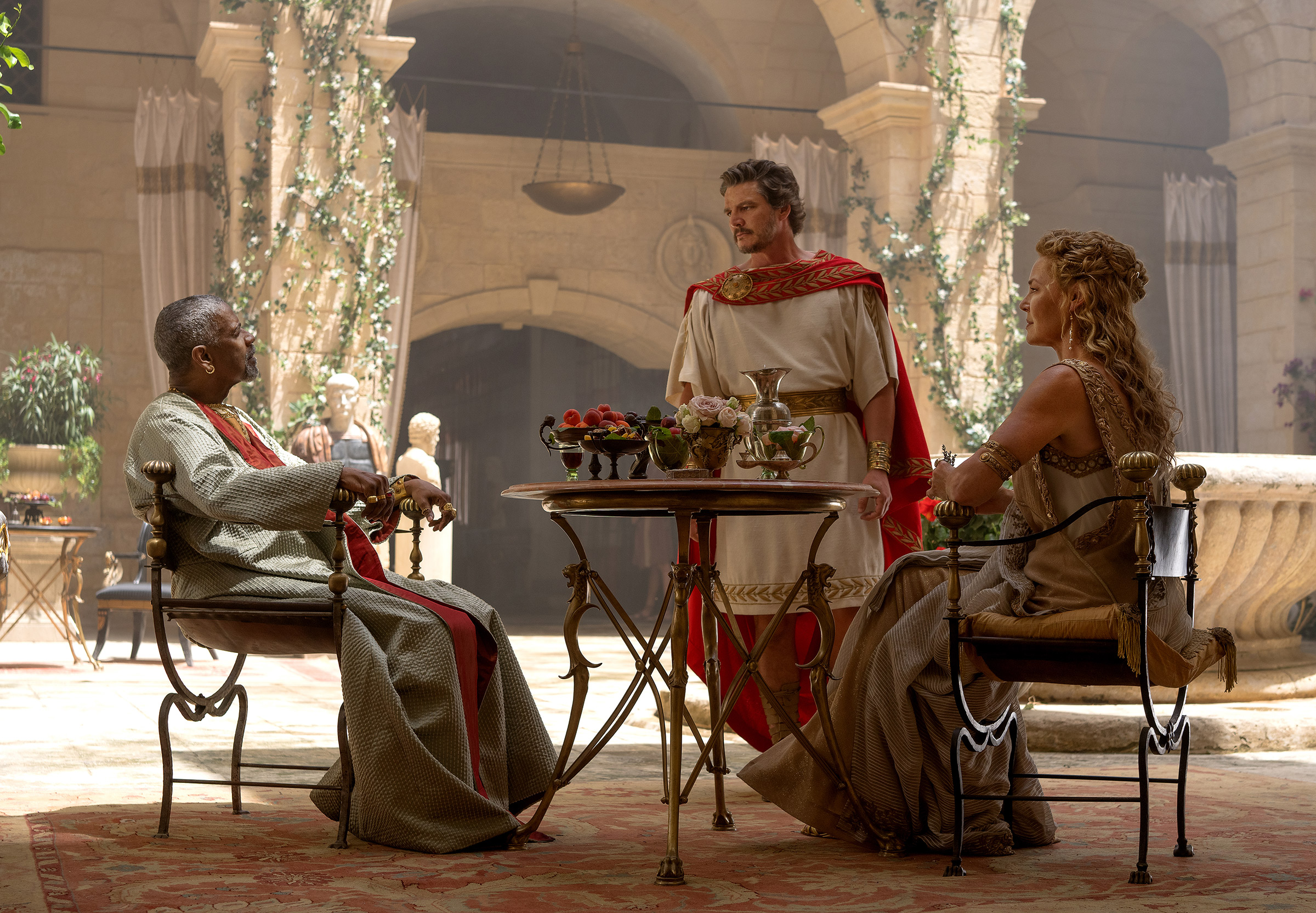 Denzel Washington as Macrinus, Pedro Pascal as General Acacius and Connie Nielsen as Lucilla in Gladiator II
