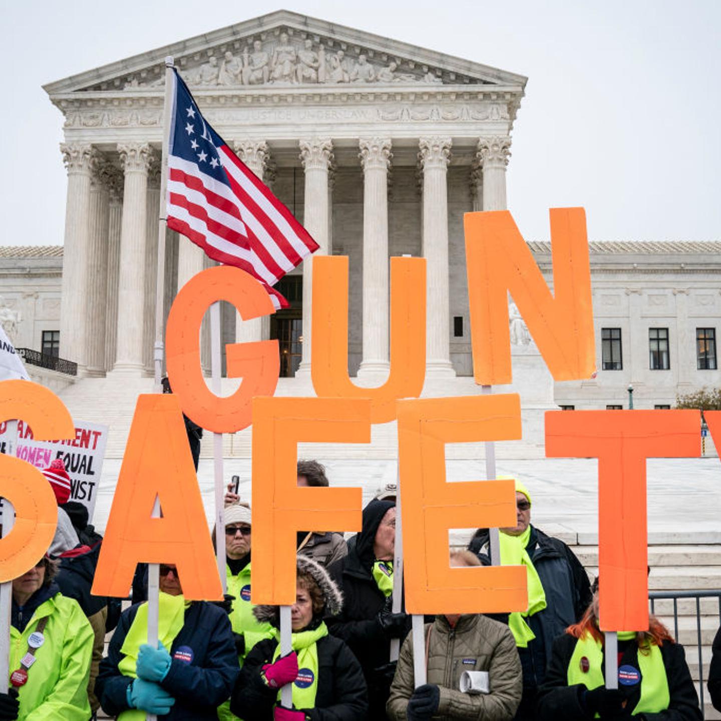 Gun safety advocates rally in front of the U.S. Supreme Court
