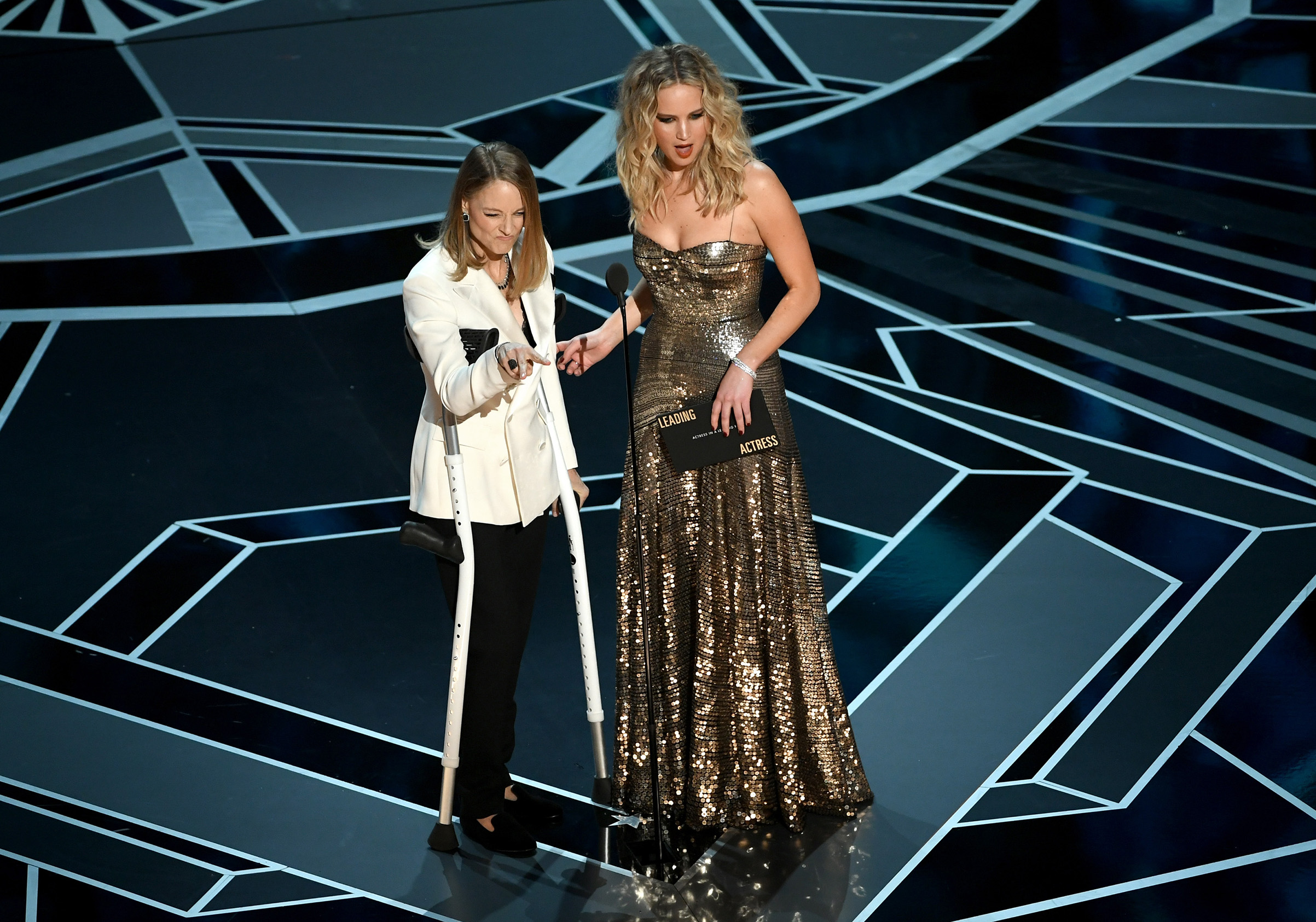 Actors Jodie Foster and Jennifer Lawrence speak onstage during the 90th Annual Academy Awards at the Dolby Theatre at Hollywood &amp; Highland Center on March 4, 2018 in Hollywood.
