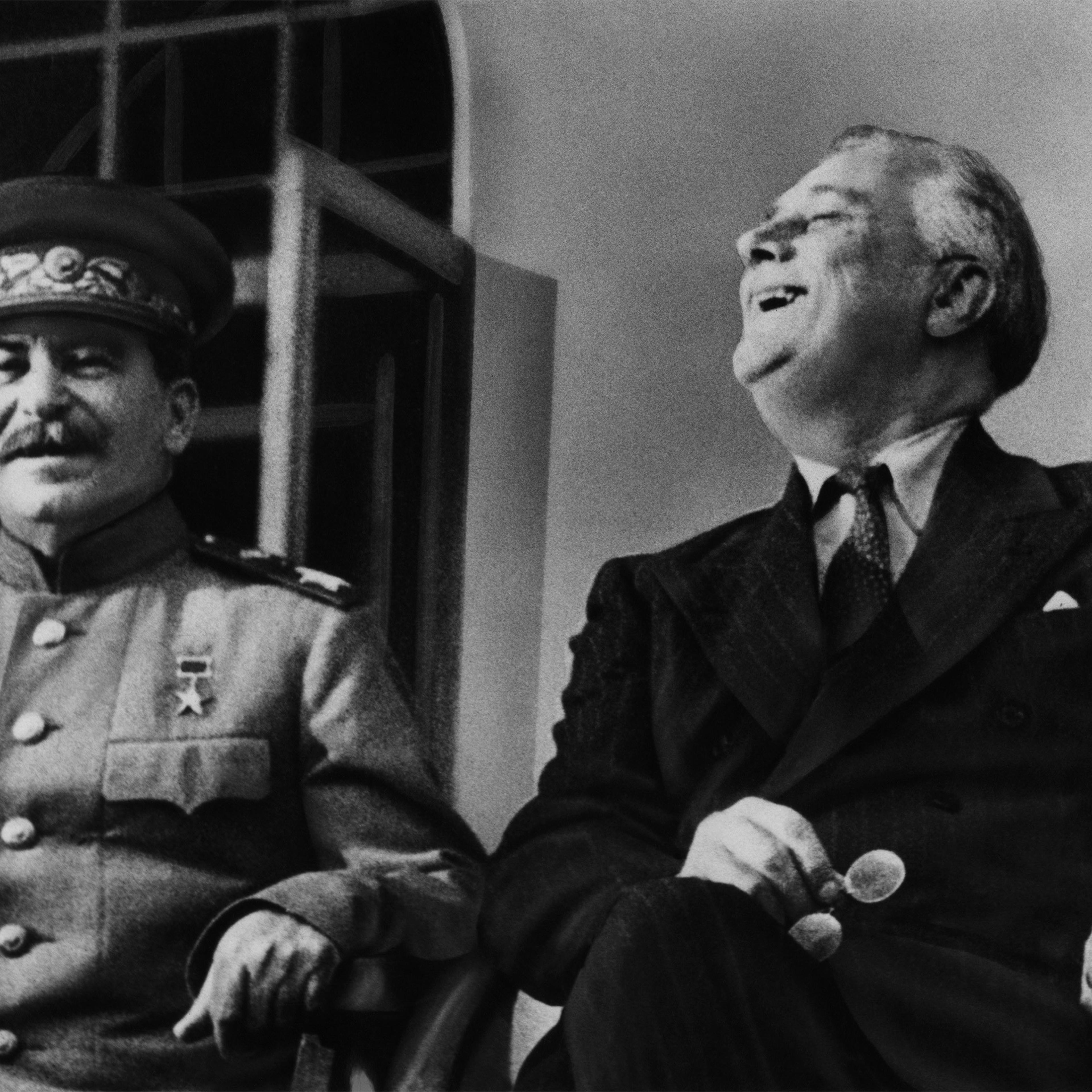 Soviet Premier Josef Stalin and US President Franklin Delano Roosevelt appear on the porch of the Russian embassy in Tehran, Iran in 1943.