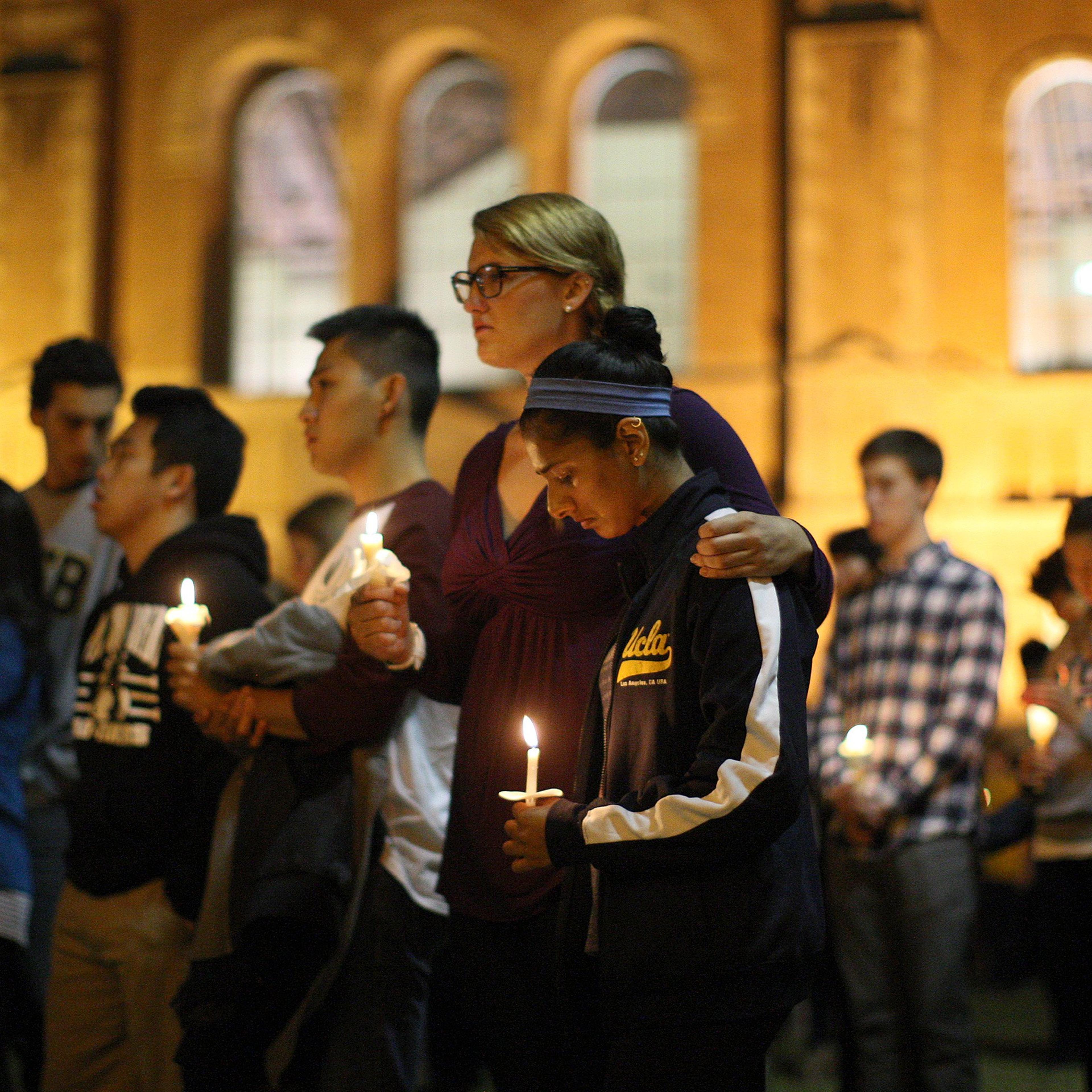 Students of UCSB and UCLA mourn at a candlelight vigil at UCLA for the victims of a killing rampage over the weekend on May 26, 2014 in Los Angeles.