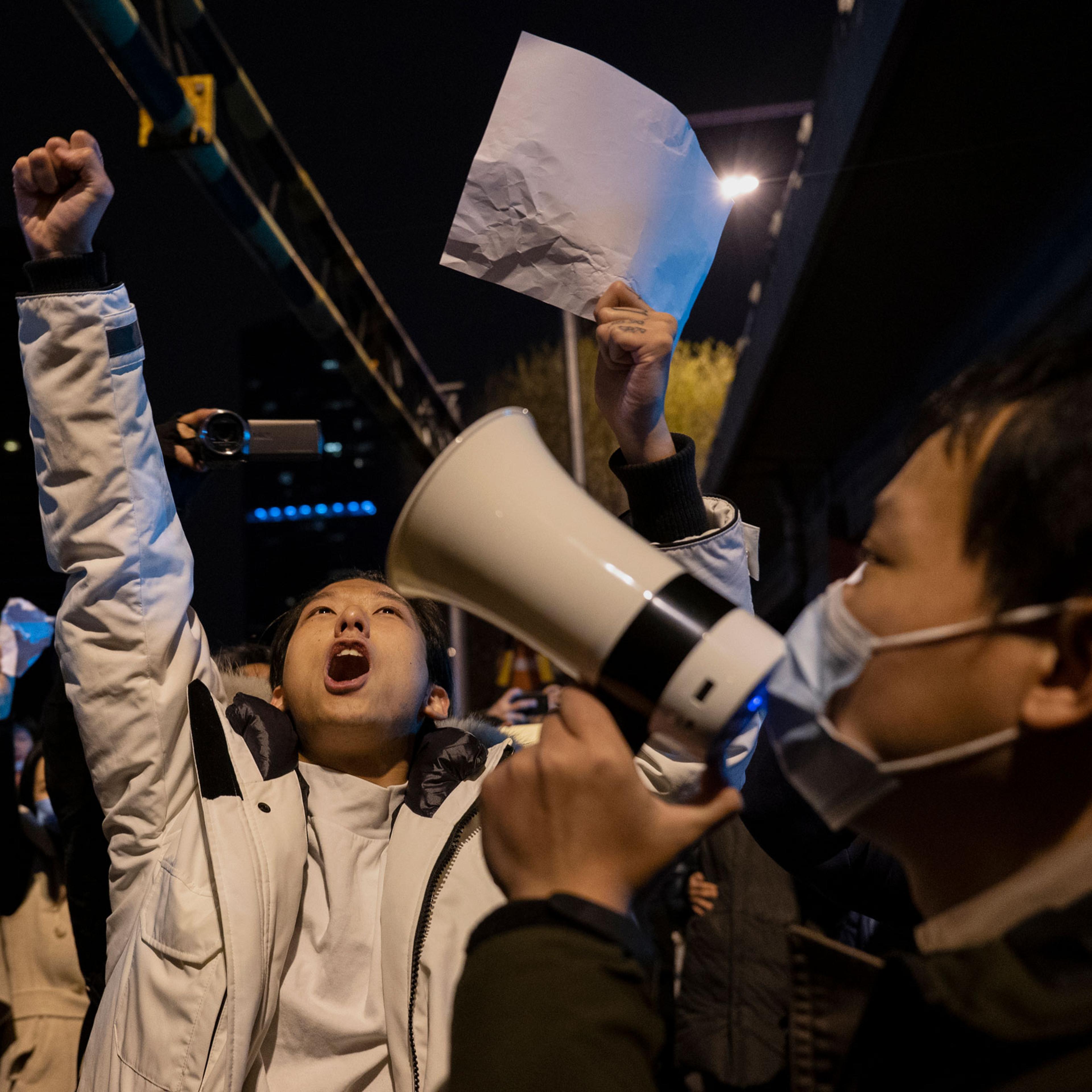 Protesters shout slogans during a protest against Chinas strict zero COVID measures on Nov. 28, 2022 in Beijing, China.