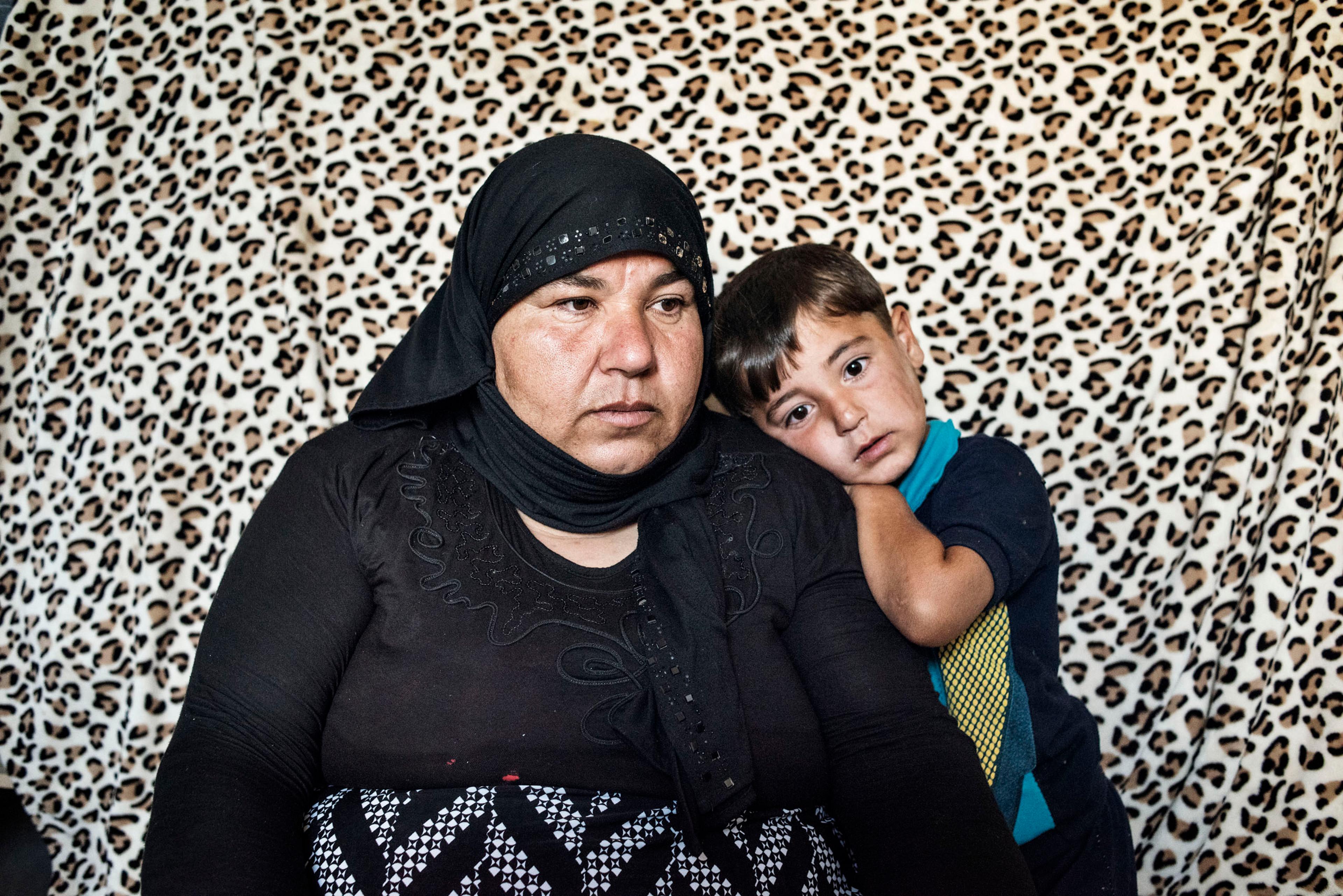 Nasima Abdo, 35, a member of the Yazidi religious minority, appears in a camp for displaced people outside the city of Dohuk, in Iraq's autonomous Kurdish region, May 19, 2016. Abdo and three of her children were taken captive by ISIS fighters in August