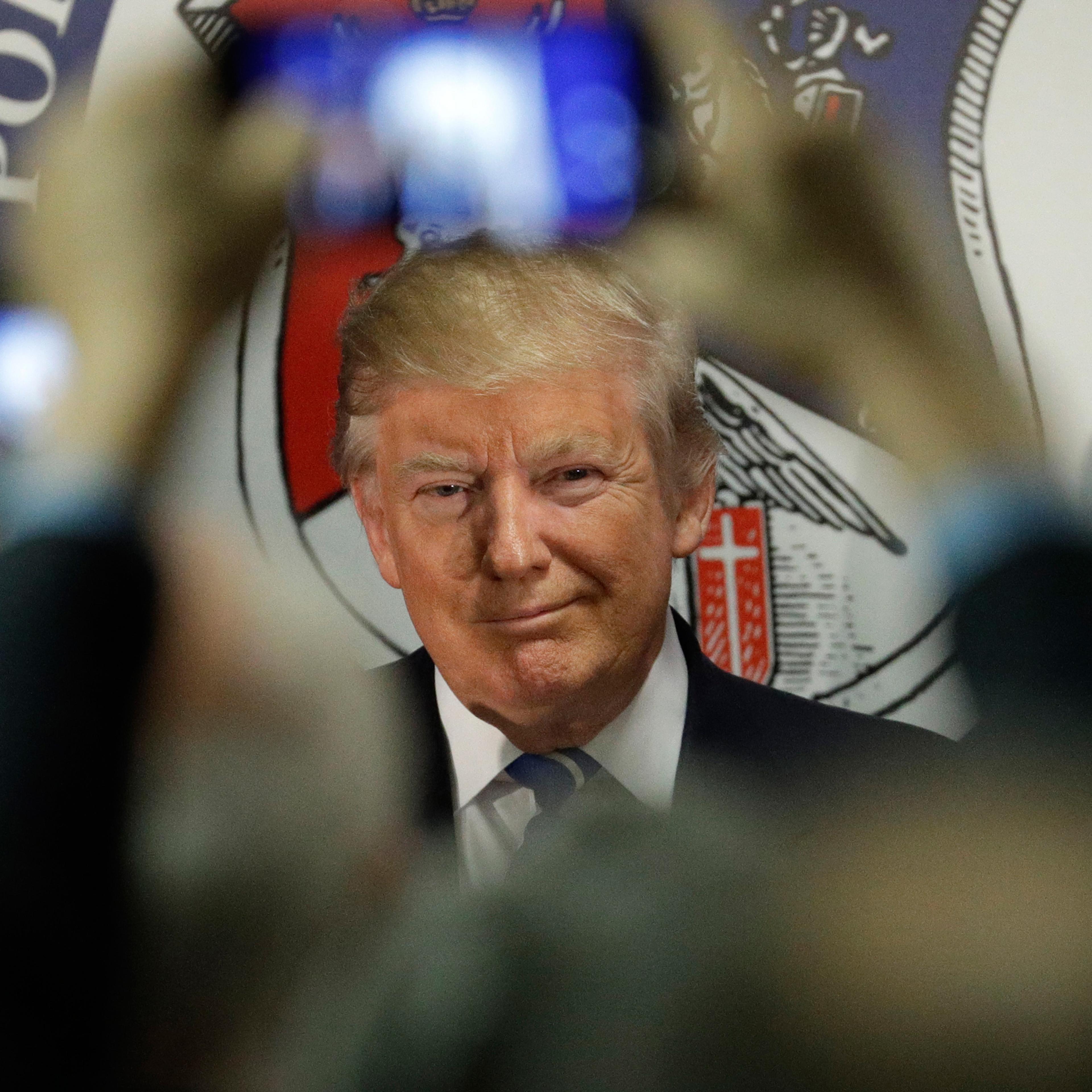 Republican presidential candidate Donald Trump meets with people after speaking at the Polish National Alliance, Wednesday, Sept. 28, 2016, in Chicago. (AP Photo/John Locher)