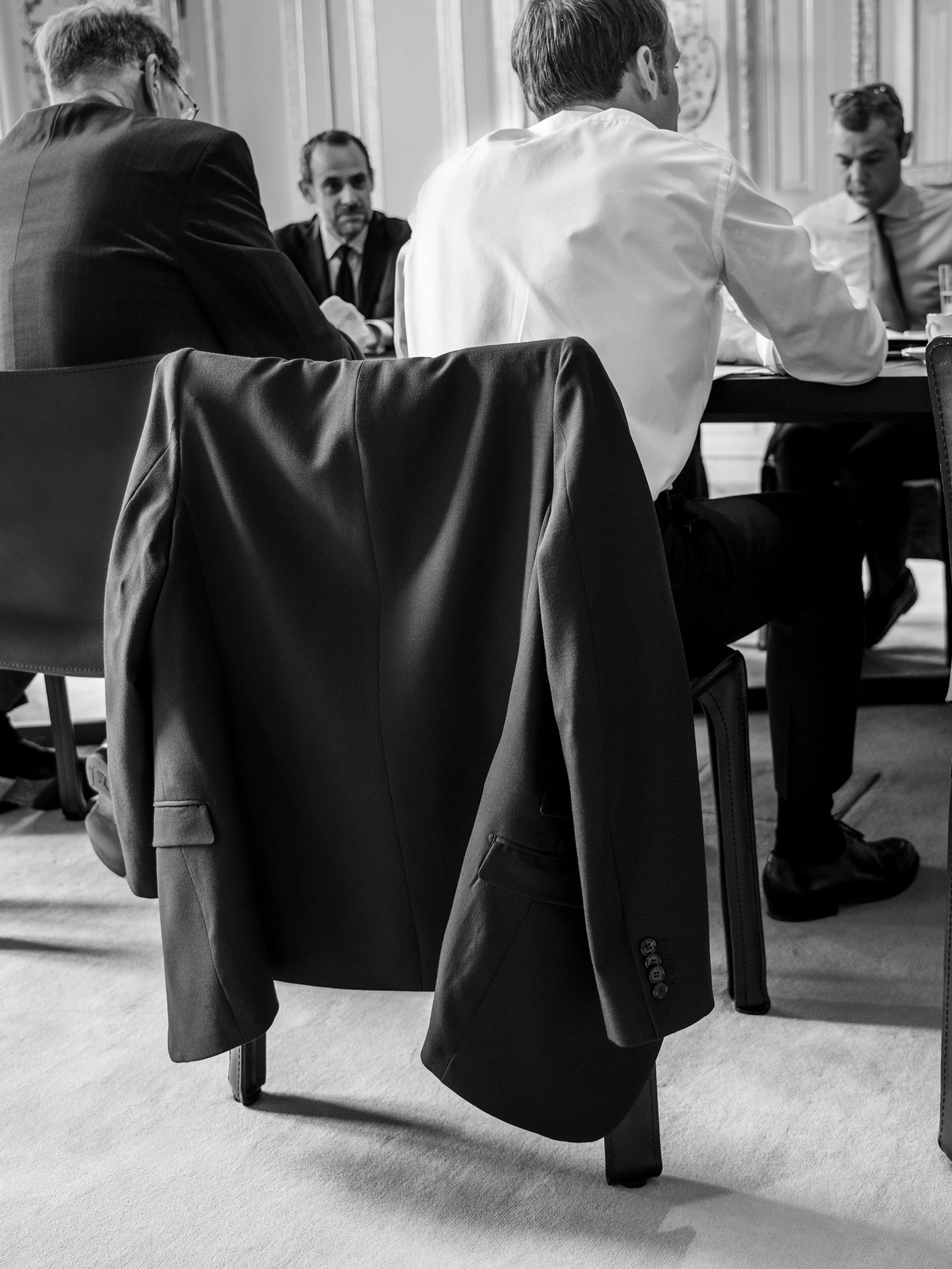 Macron during a meeting with senior advisers