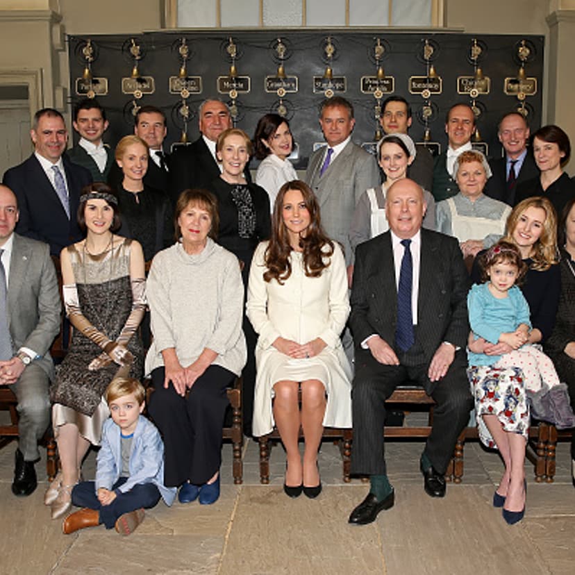 Catherine, Duchess of Cambridge (C) poses with cast, crew and producers of 'Downton Abbey' during an official visit to the set of Downton Abbey at Ealing Studios in London, England on March 12, 2015.