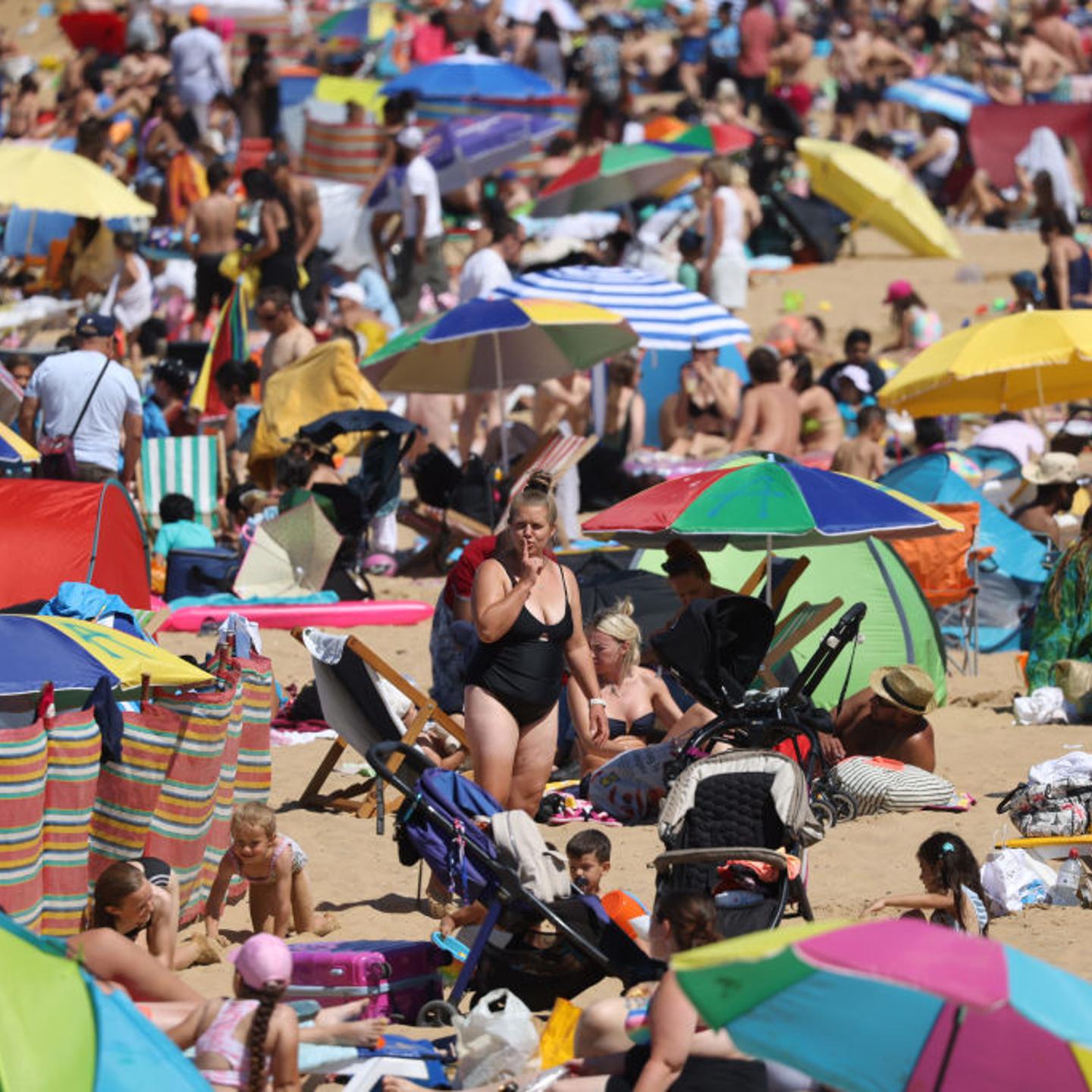 Health Alert Raised As Hot Weather Continues Across The UK