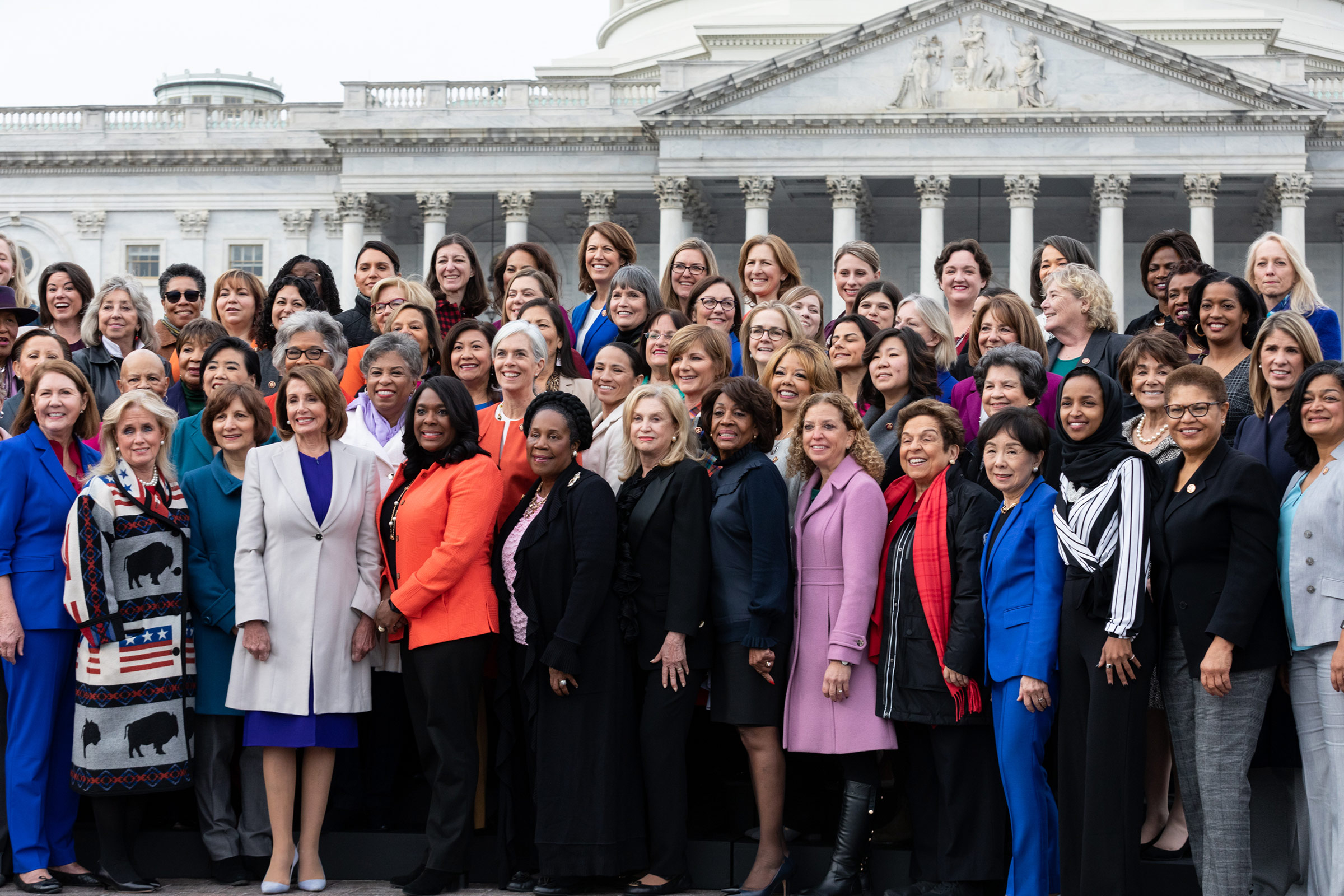 Speaker Nancy Pelosi (D-CA), (4th from left, front row), poses for a group photo with her fellow House Democratic women in front of the U.S. Capitol in Washington, DC, on January 4. The 116th Congress currently has the largest number of female members.