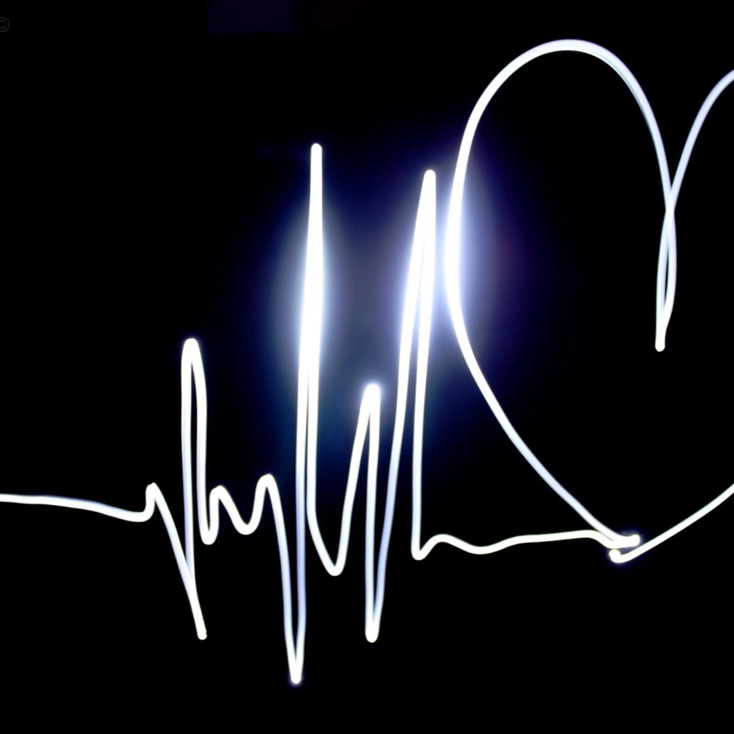 Heart Shape Made From Pulse Trace On Black Background