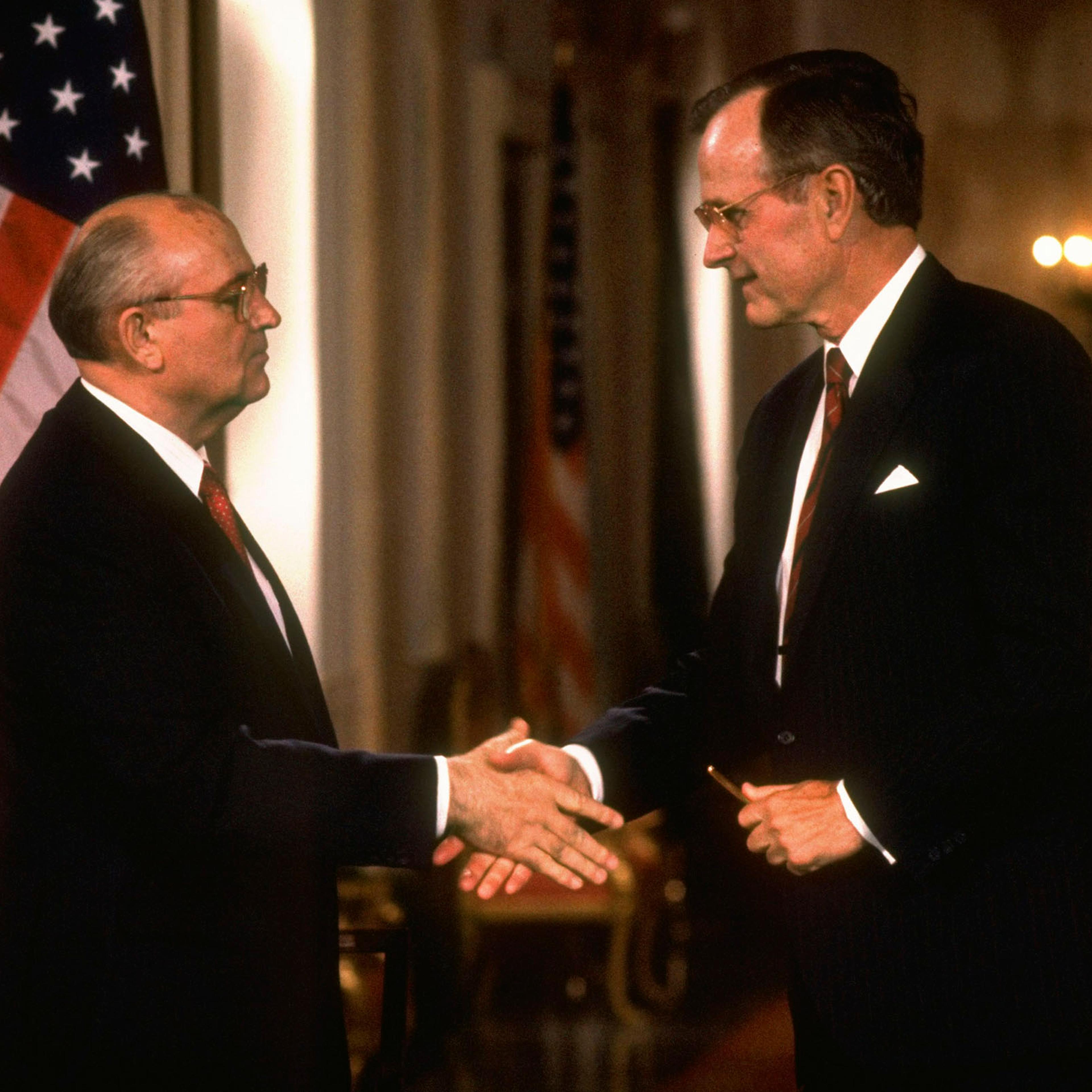Gorbachev, left, shakes Bush’s hand after signing an agreement on June 1, 1990