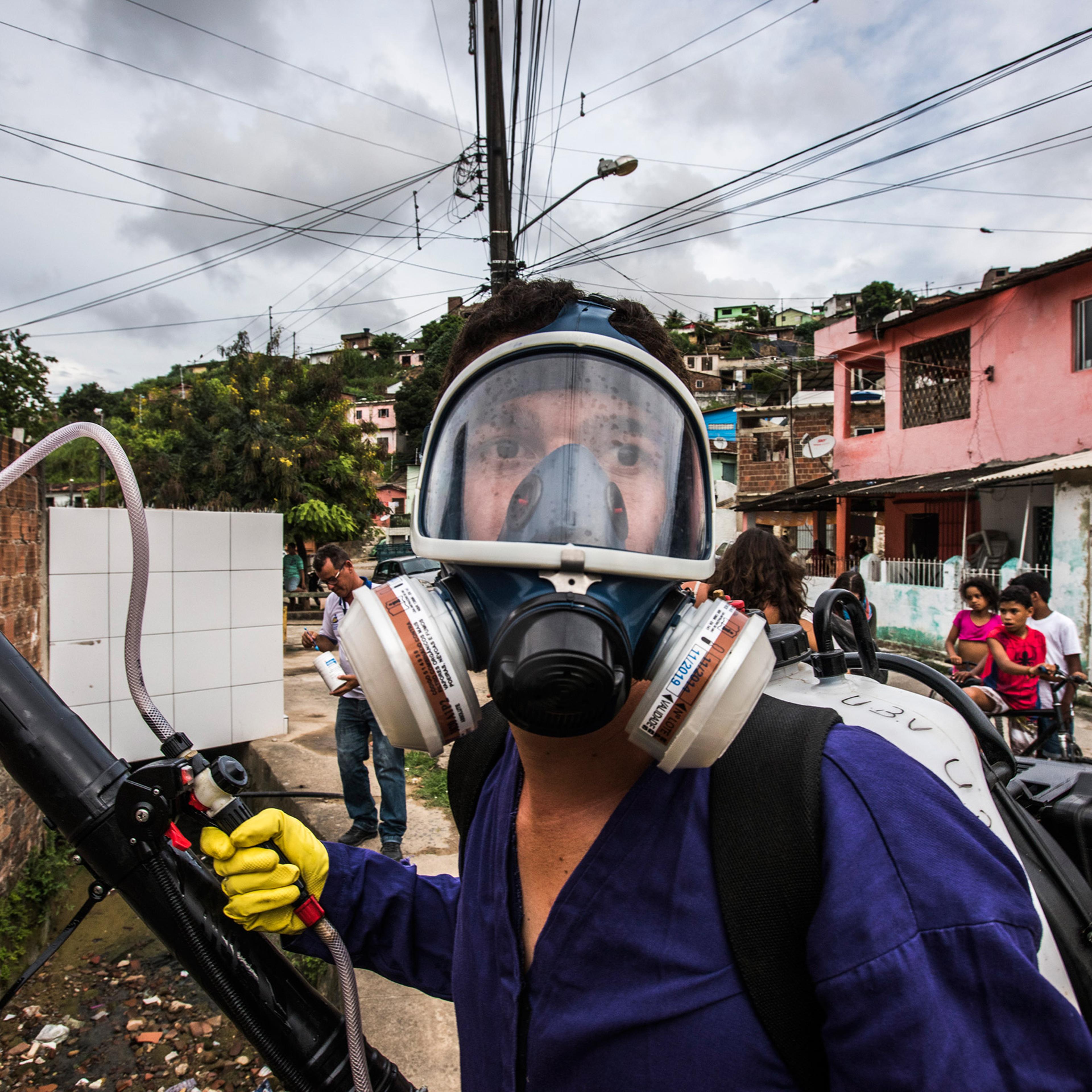 A health worker sprays insecticide in the Nova Descoberta neighborhood of Recife, Brazil, Feb. 1, 2016. Recife became Ground Zero for the outbreak of Zika cases.